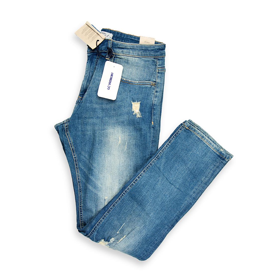 A high-fashion, streetwear-ready pair of men's jeans featuring a bright, vintage light-blue wash.