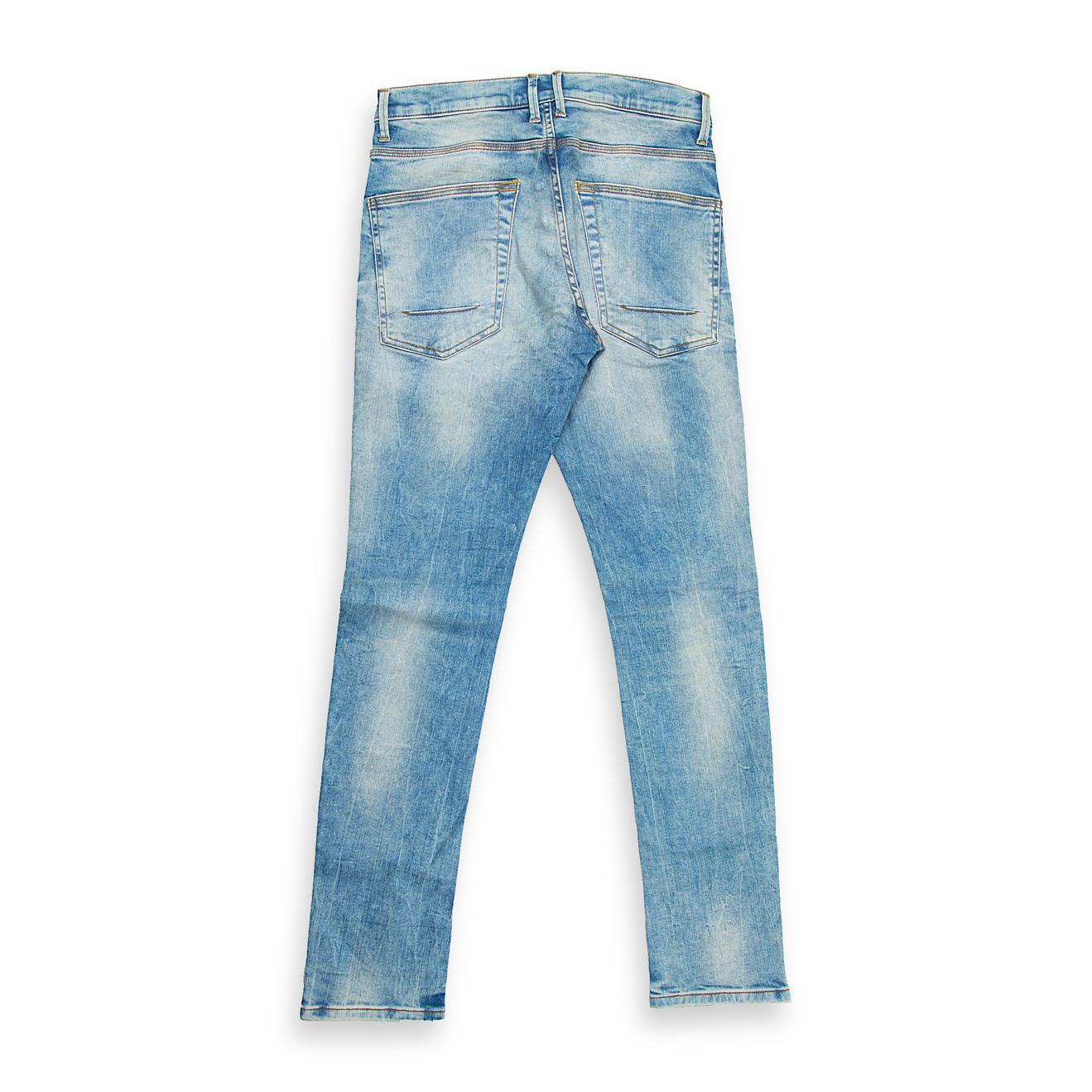 These striking skinny-fit jeans are designed for a bold, fashion-forward statement. Featuring a distinct light blue, acid-wash finish, they offer a highly faded and worn-in look right off the shelf.