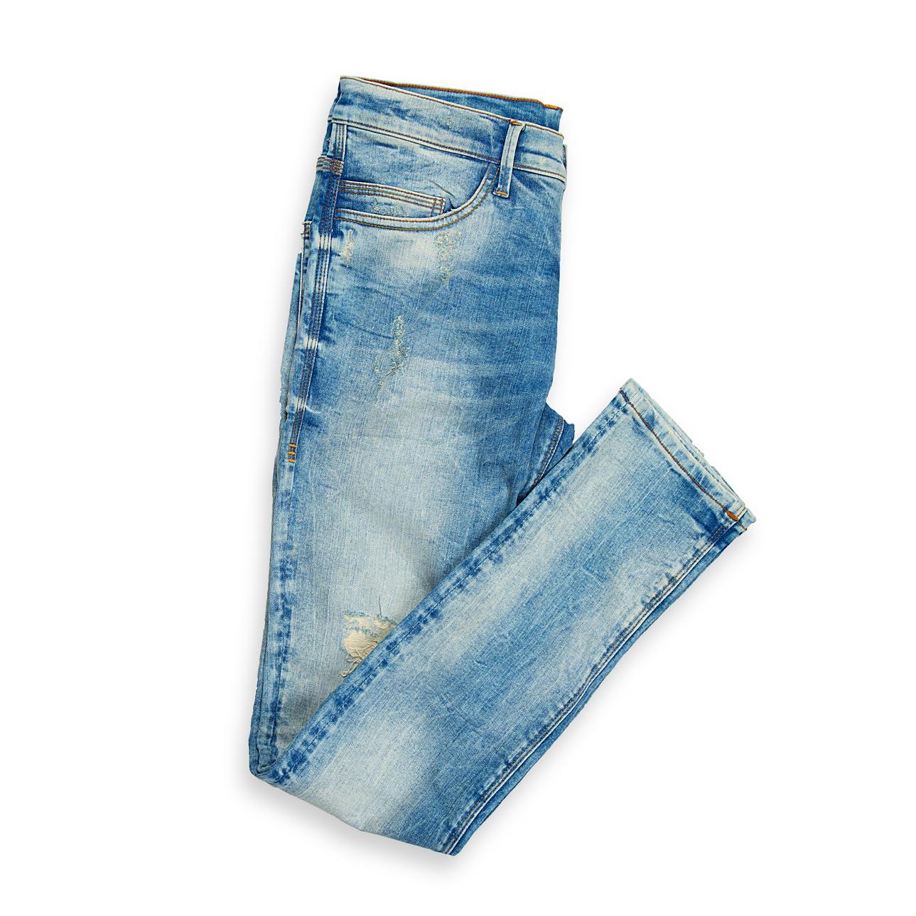These striking skinny-fit jeans are designed for a bold, fashion-forward statement. Featuring a distinct light blue, acid-wash finish, they offer a highly faded and worn-in look right off the shelf.