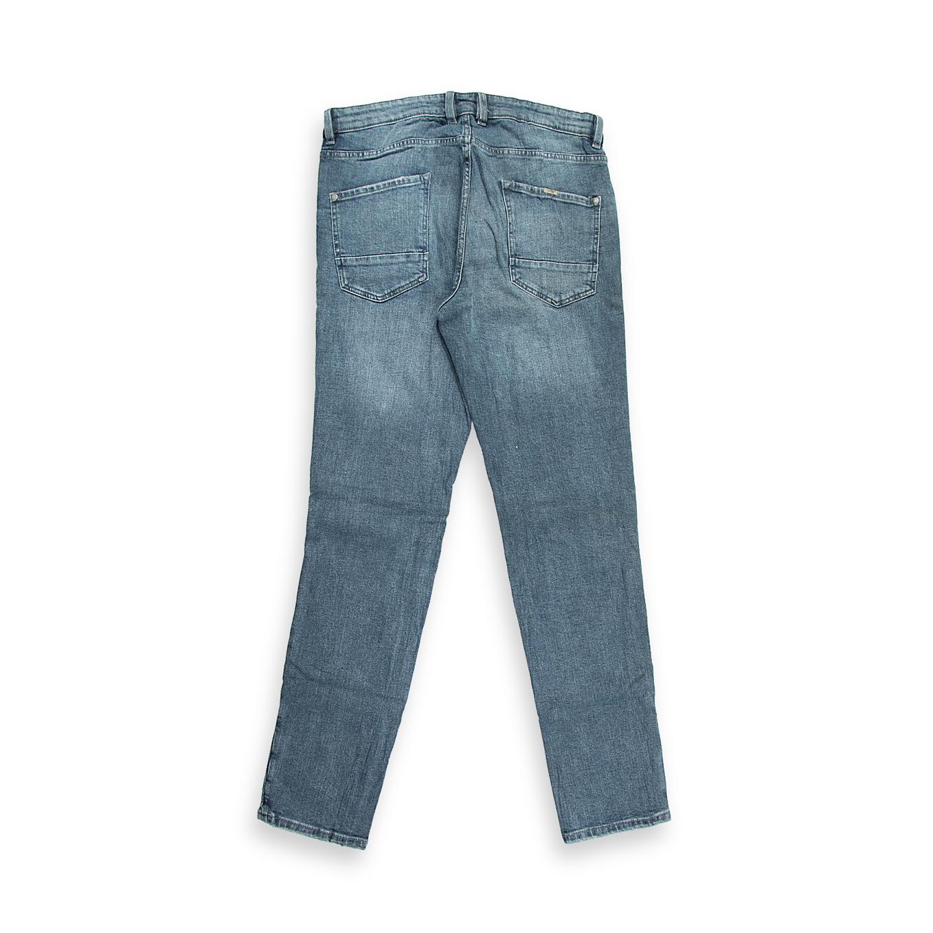 This is a versatile pair of Classic Straight-Leg Denim Jeans in a popular mid-wash blue.