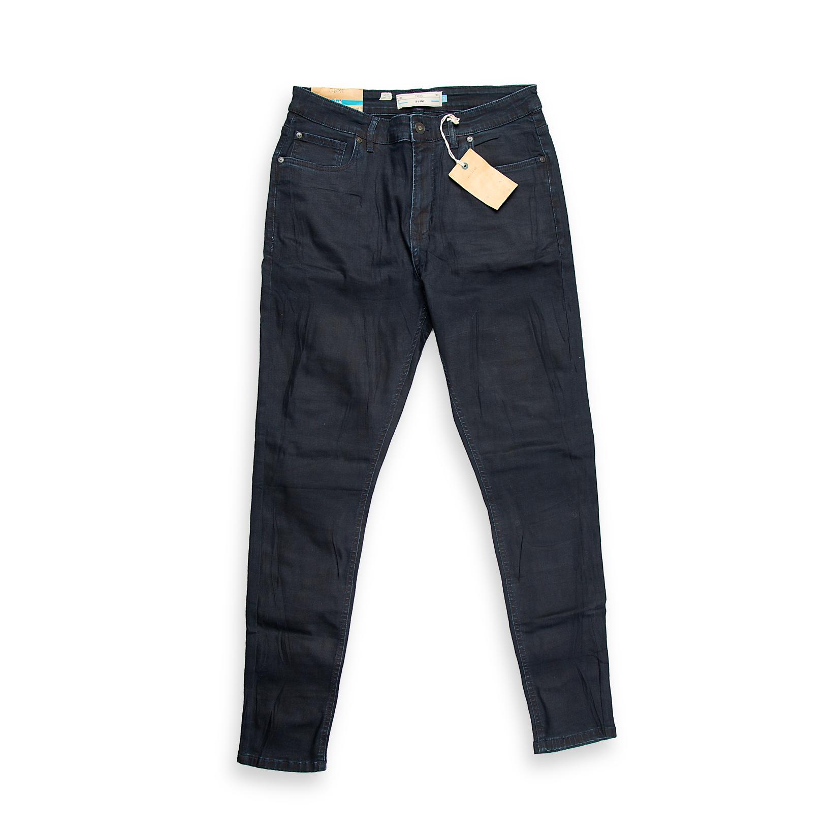 This is a modern pair of Men's Skinny-Fit Jeans featuring a very deep, uniform dark-wash with minimal fading.