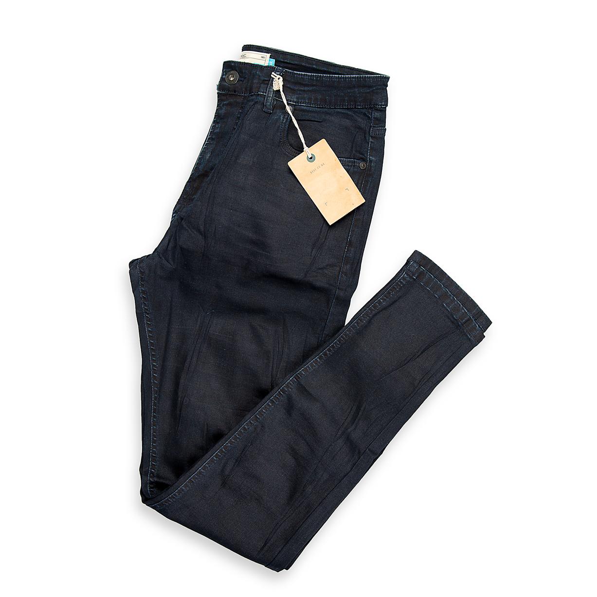 This is a modern pair of Men's Skinny-Fit Jeans featuring a very deep, uniform dark-wash with minimal fading.
