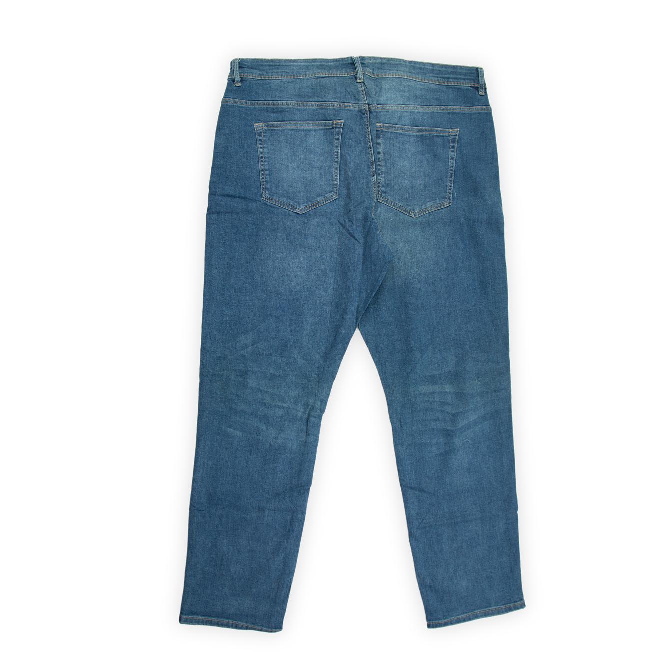 They feature a classic mid-blue wash with subtle fading and whiskering for a natural, broken-in look.