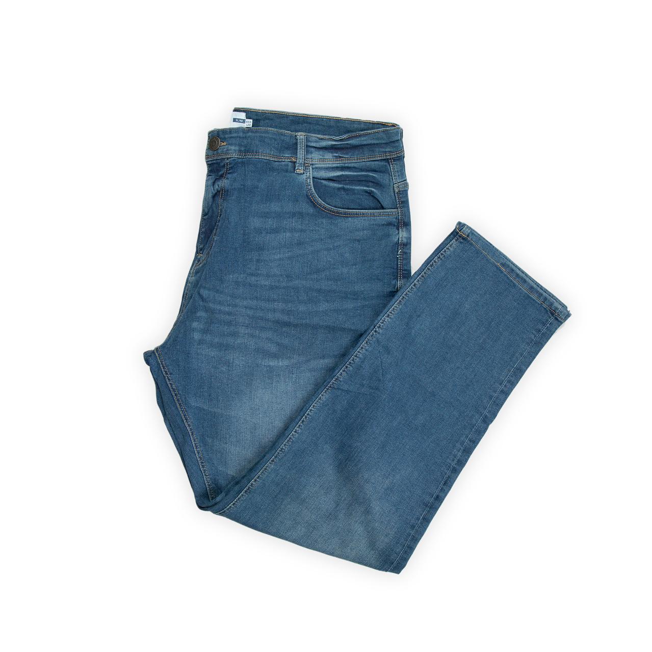 They feature a classic mid-blue wash with subtle fading and whiskering for a natural, broken-in look.