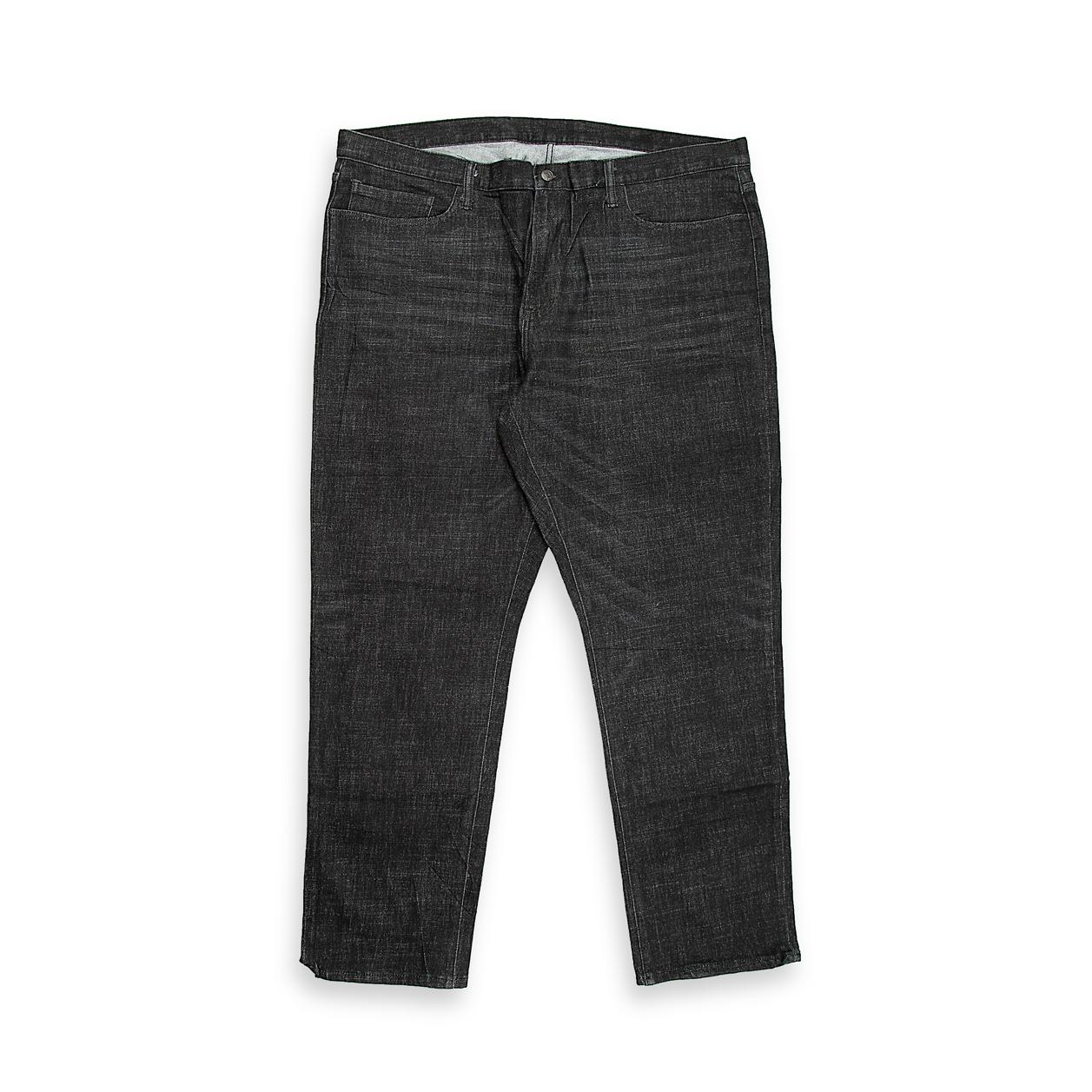 A sharp and sophisticated pair of five-pocket jeans in a deep, dark charcoal wash.