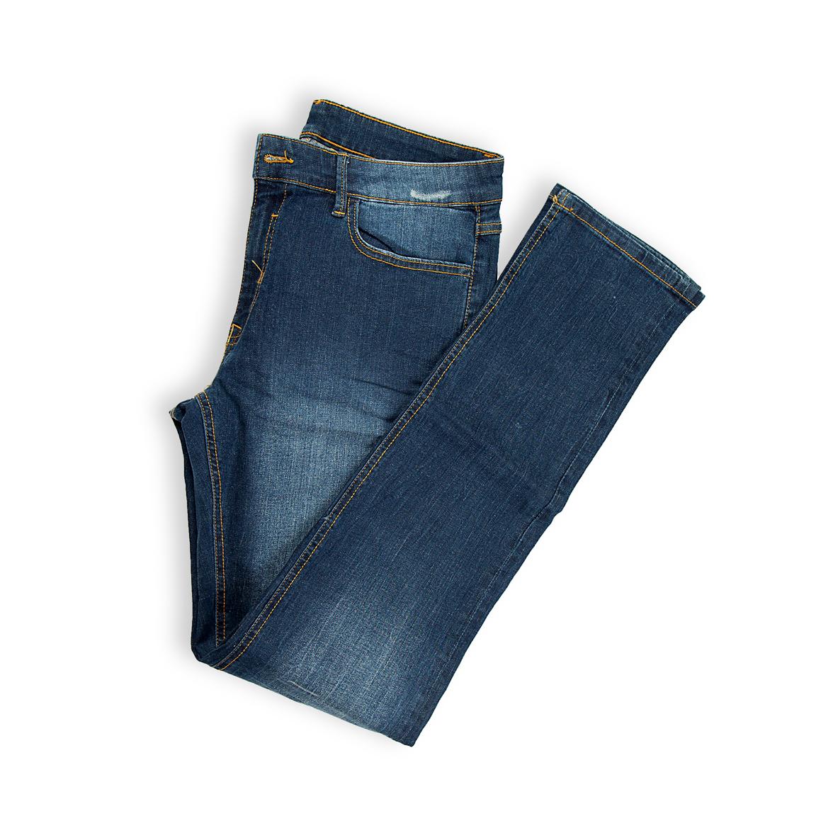 These five-pocket jeans boast a stylish wash that transitions from dark indigo at the seams to a lighter medium blue through the thigh, enhanced by subtle whiskering and light fading.