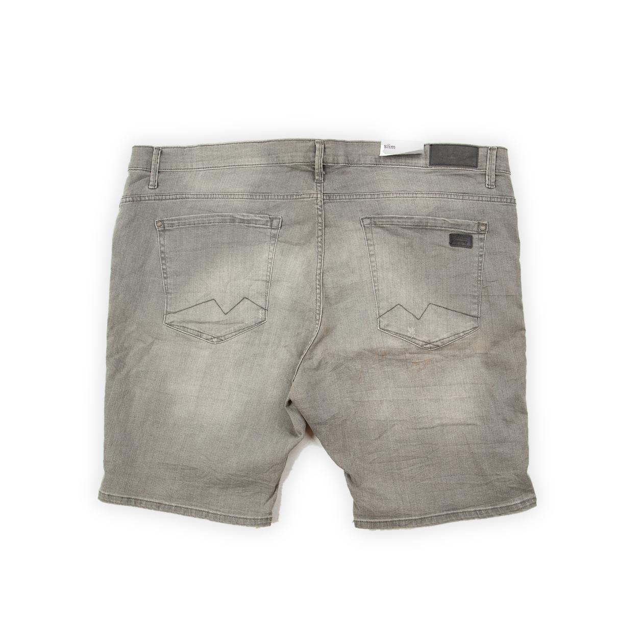 These are on-trend, slim-fit denim shorts with a contemporary washed grey or charcoal color, achieved through an industrial rinse process.