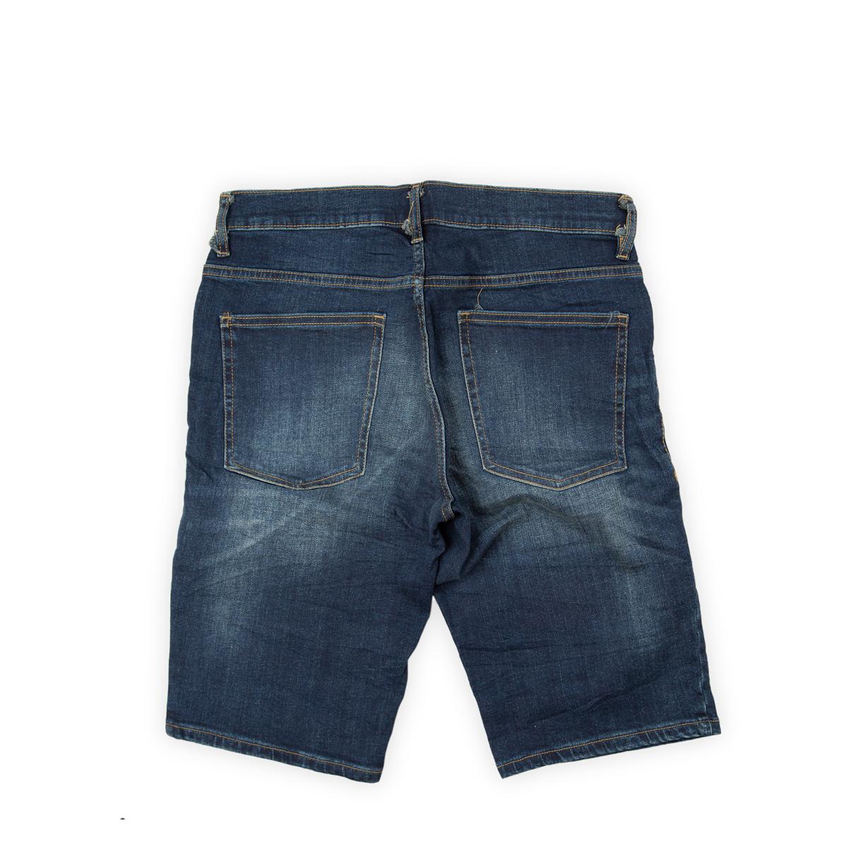 These traditional denim shorts are a reliable staple for everyday casual wear. They feature a dark-to-medium indigo wash with moderate fading and whiskering across the thigh, giving them a subtly worn-in look.