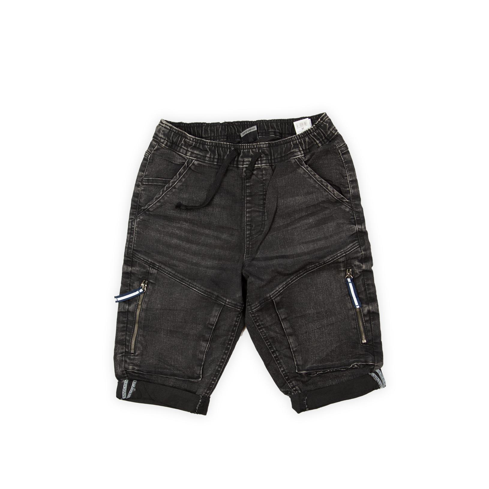 These are comfortable, casual shorts or culottes with a functional, jogger-style design. They feature a relaxed fit and are made from a black-wash denim or durable fabric.