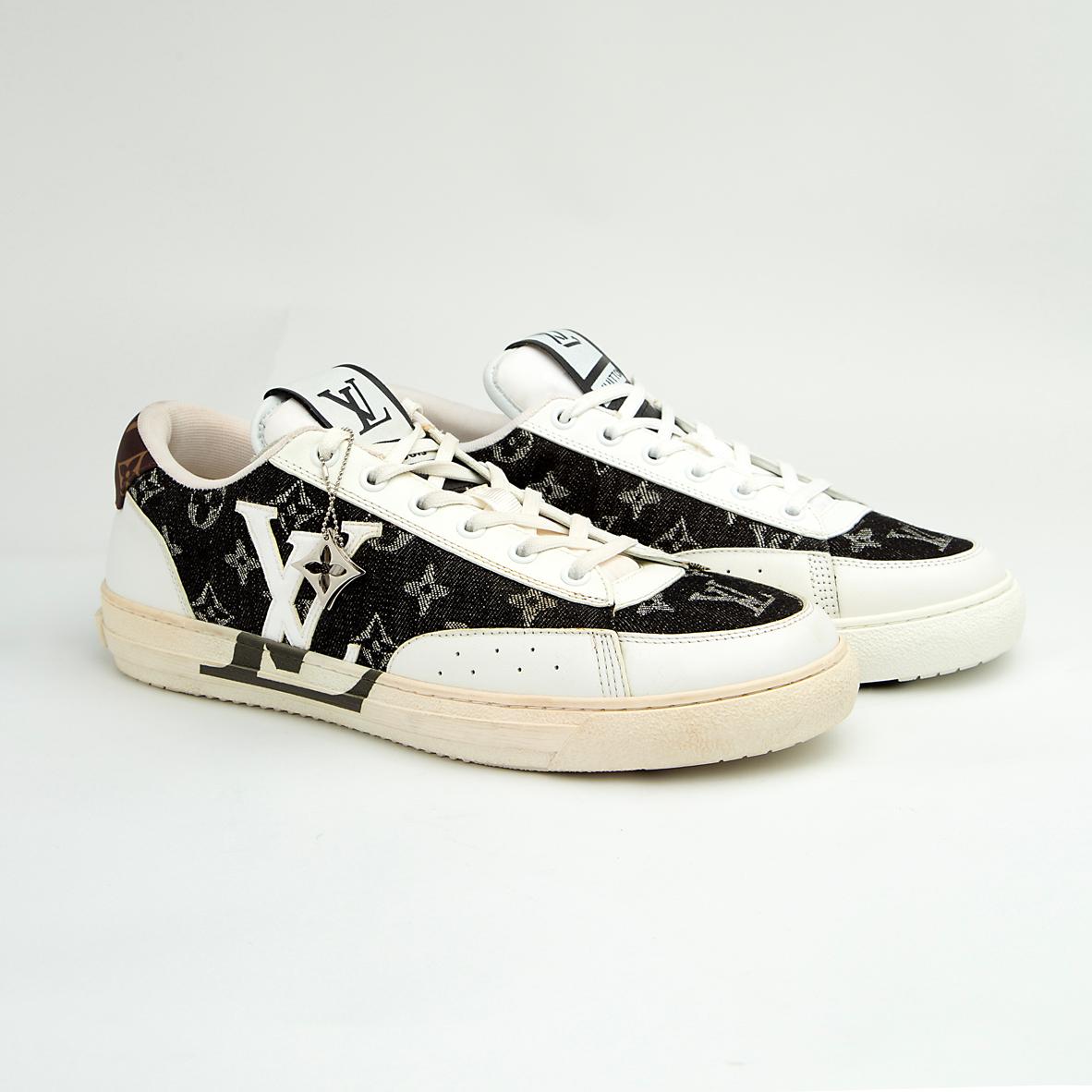 The LV Trainer Sneaker is a luxury low-top sneaker that blends high-fashion craftsmanship with a retro basketball and skate shoe aesthetic.