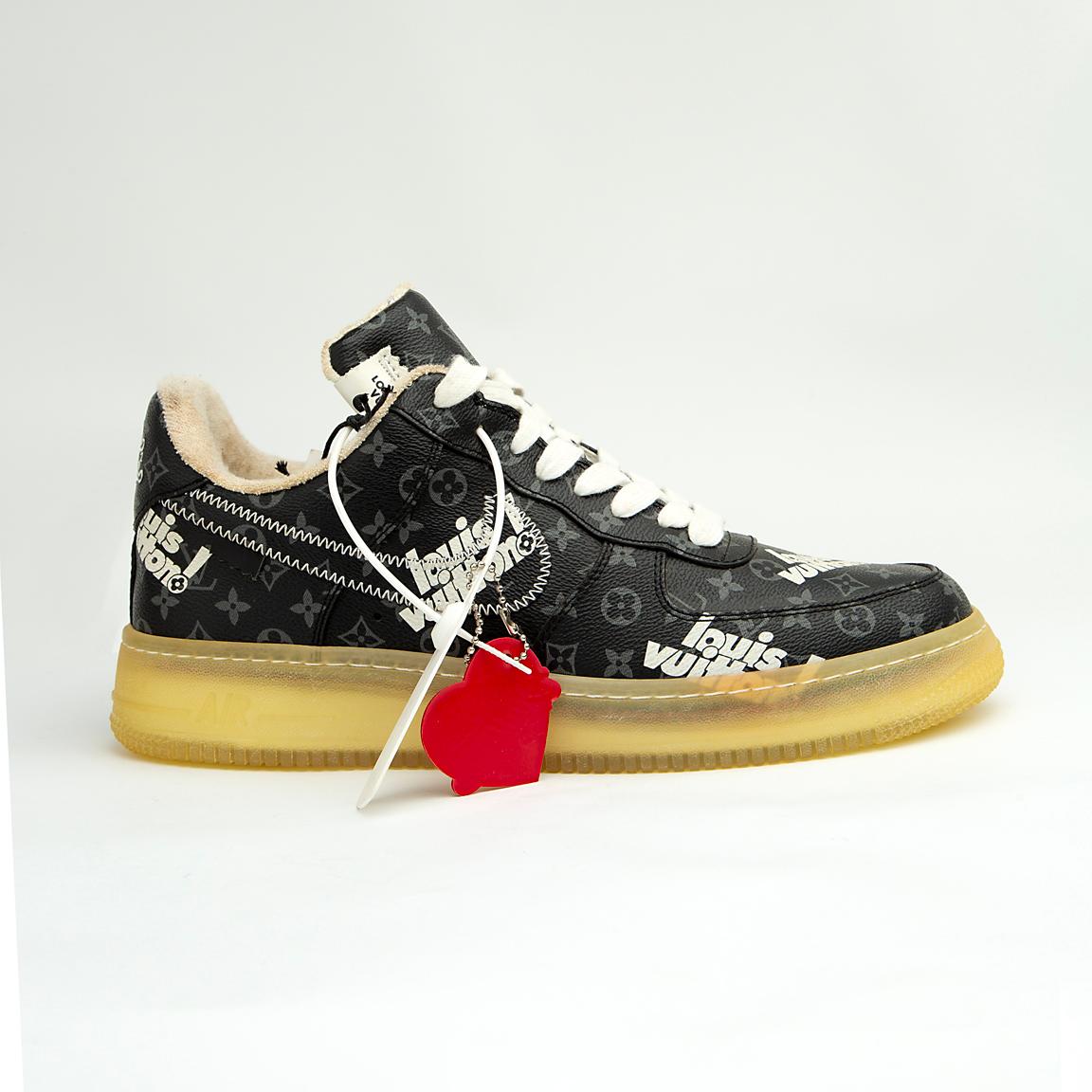 This is a highly exclusive, low-top sneaker from the iconic Louis Vuitton x Nike Air Force 1 collaboration, designed by Virgil Abloh for the Louis Vuitton Spring-Summer 2022 Men's Collection.