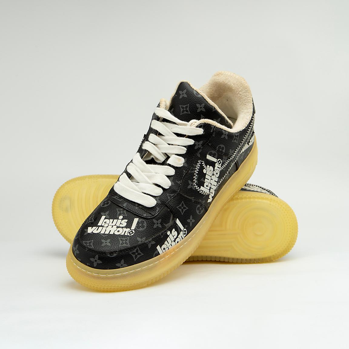 This is a highly exclusive, low-top sneaker from the iconic Louis Vuitton x Nike Air Force 1 collaboration, designed by Virgil Abloh for the Louis Vuitton Spring-Summer 2022 Men's Collection.