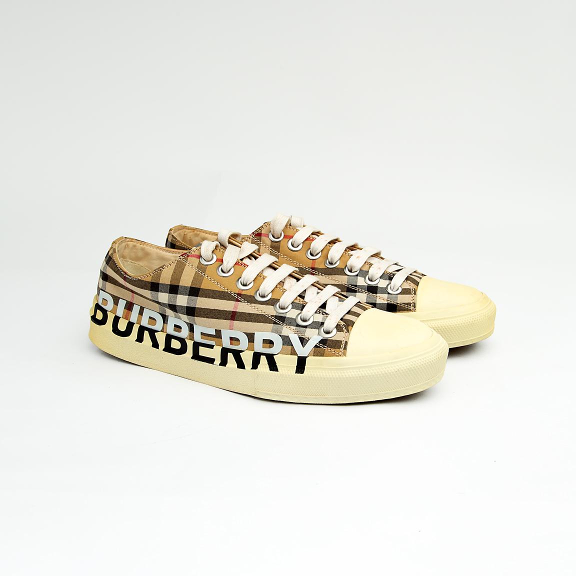 The Heritage Check Plimsoll is a contemporary luxury sneaker that reinterprets a classic canvas low-top with iconic British heritage.