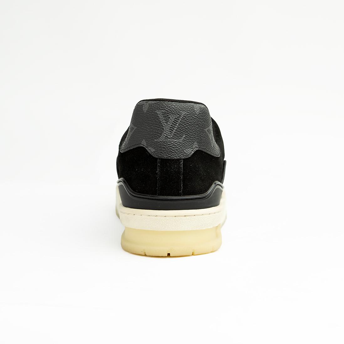 The Obsidian Monogram Ace is a high-fashion low-top sneaker that remixes a vintage court shoe silhouette with signature luxury detailing.