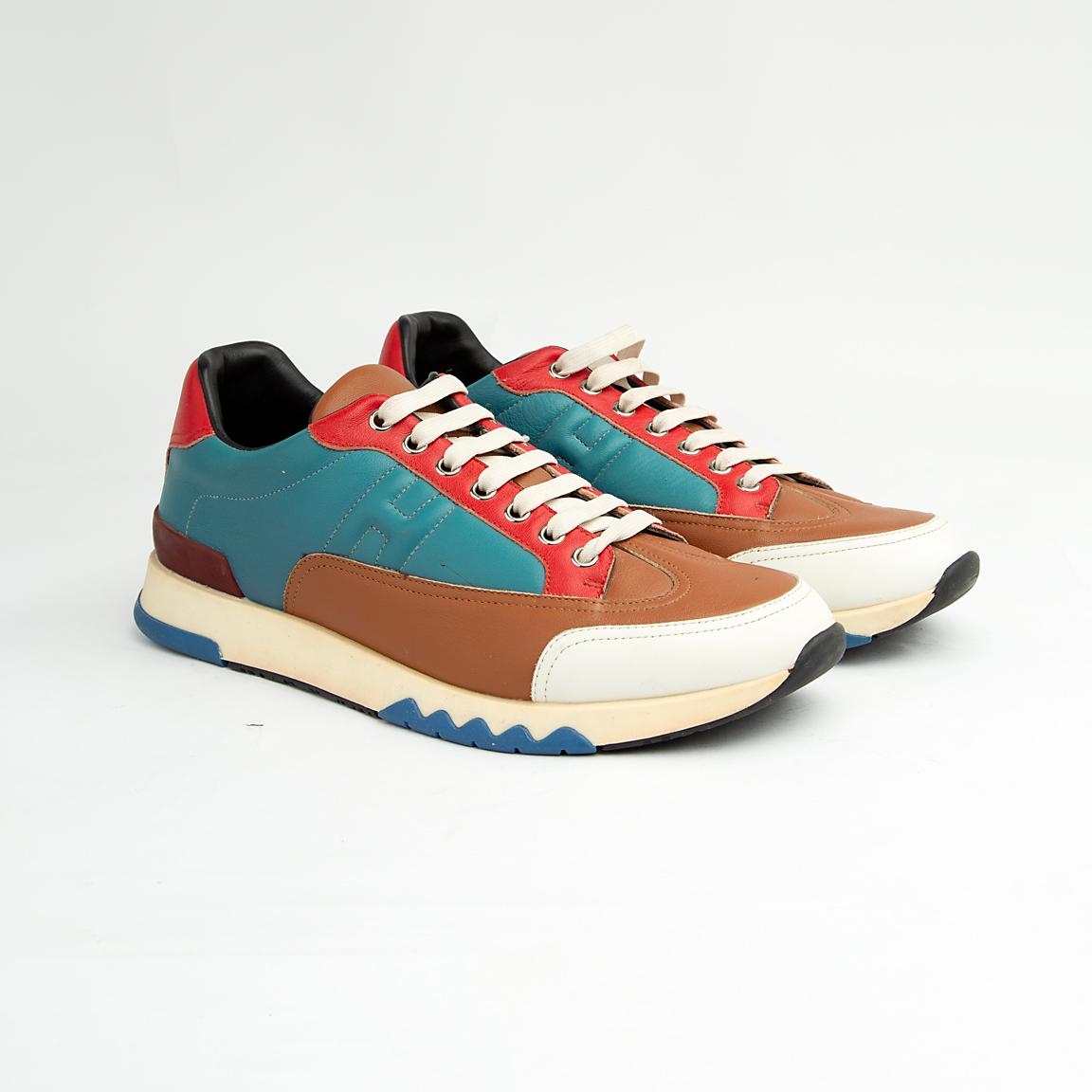 This dynamic sneaker features a rich, bold combination of smooth leather and suede paneling in an eye-catching palette