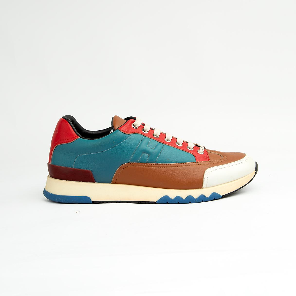 This dynamic sneaker features a rich, bold combination of smooth leather and suede paneling in an eye-catching palette