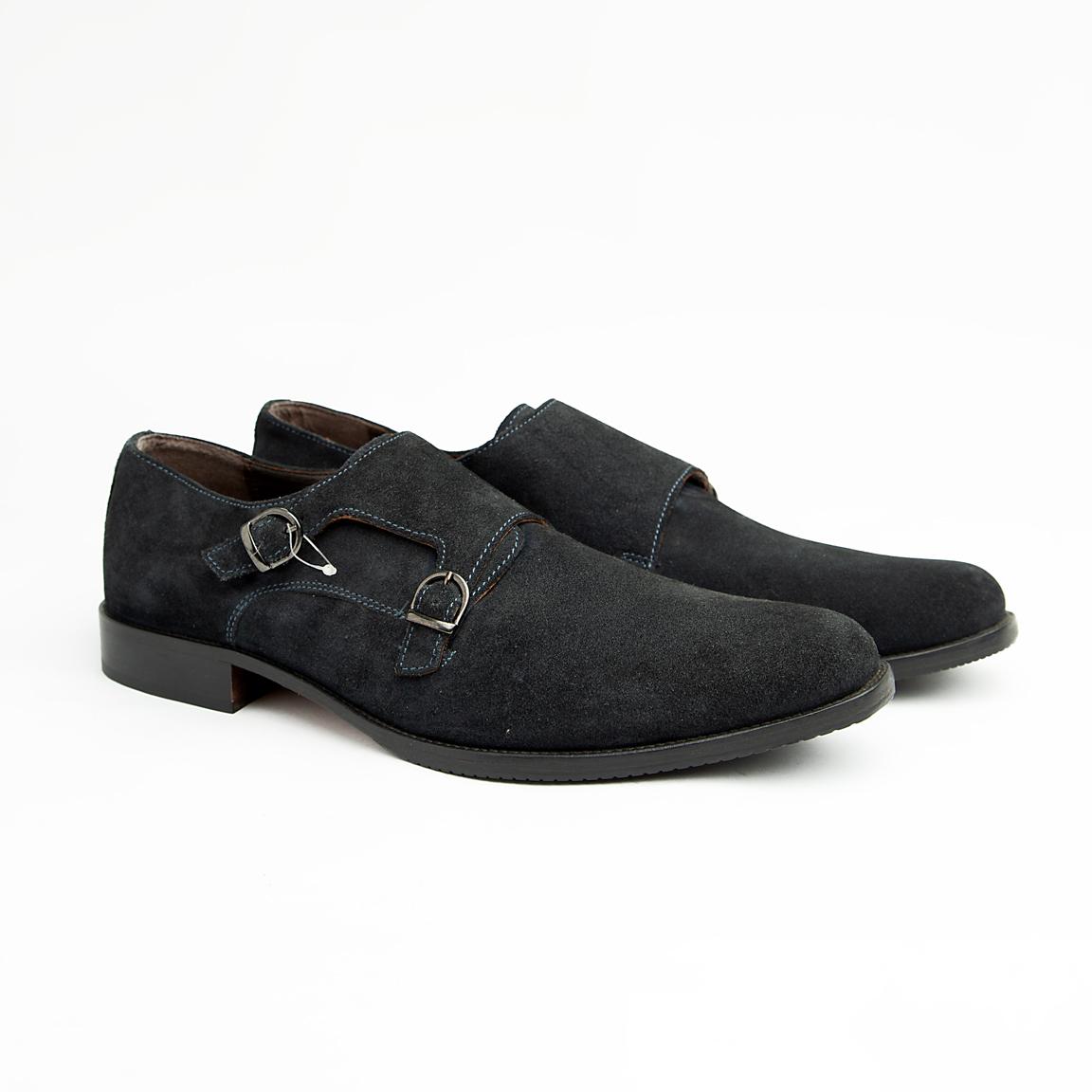 Crafted from luxurious, deep navy blue suede, these sophisticated dress shoes feature the distinguished double monk strap closure with polished silver-tone buckles, offering a timeless and secure fit.
