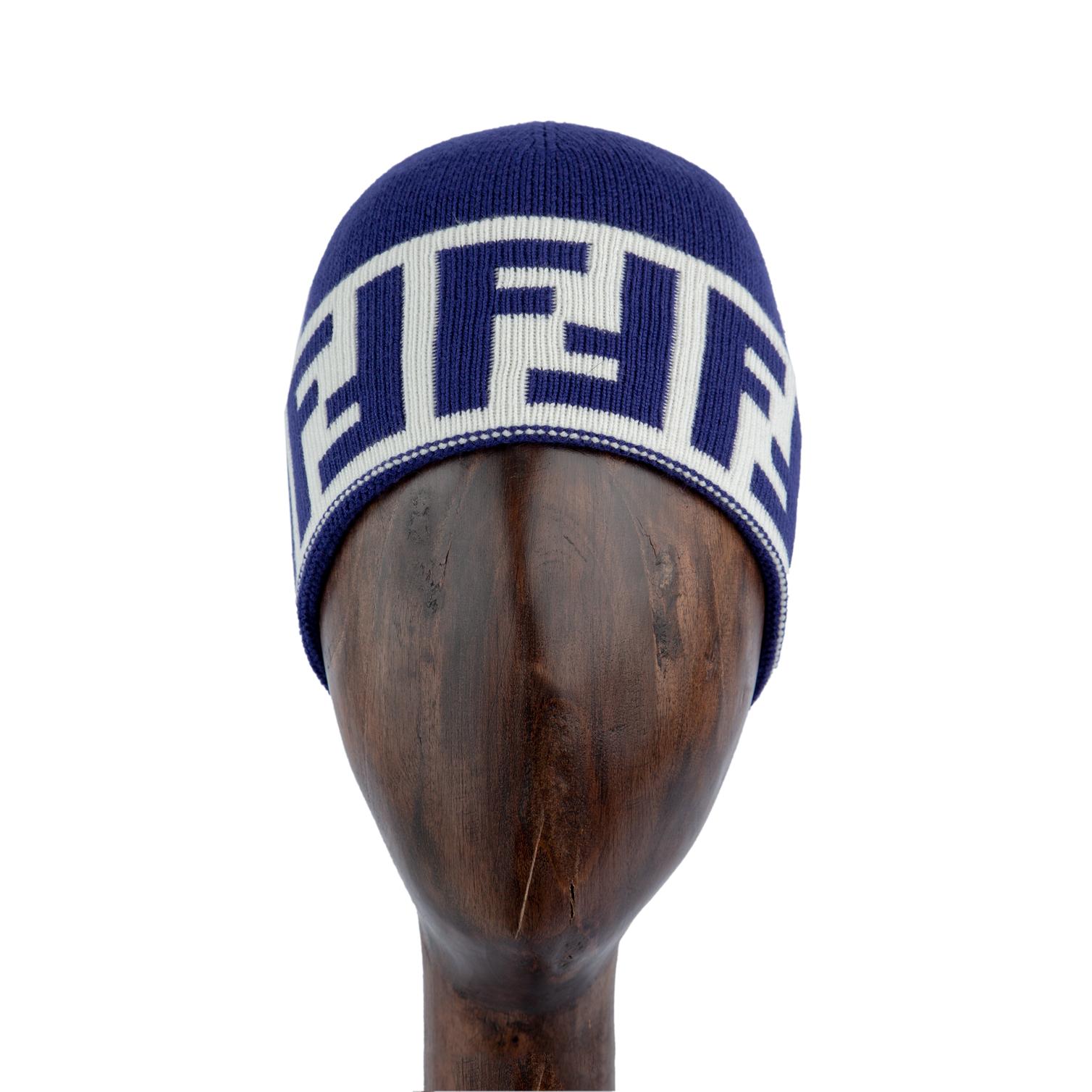 Fendi blue knit beanie with white logo band, stylish winter hat.