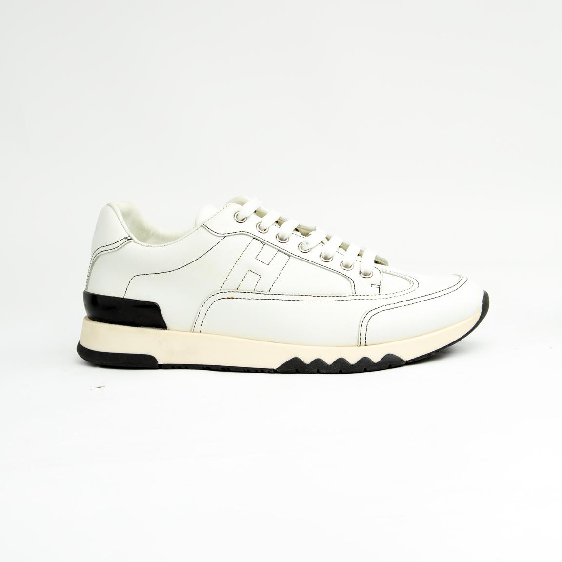 This sneaker perfectly balances classic athletic form with high-end craftsmanship.