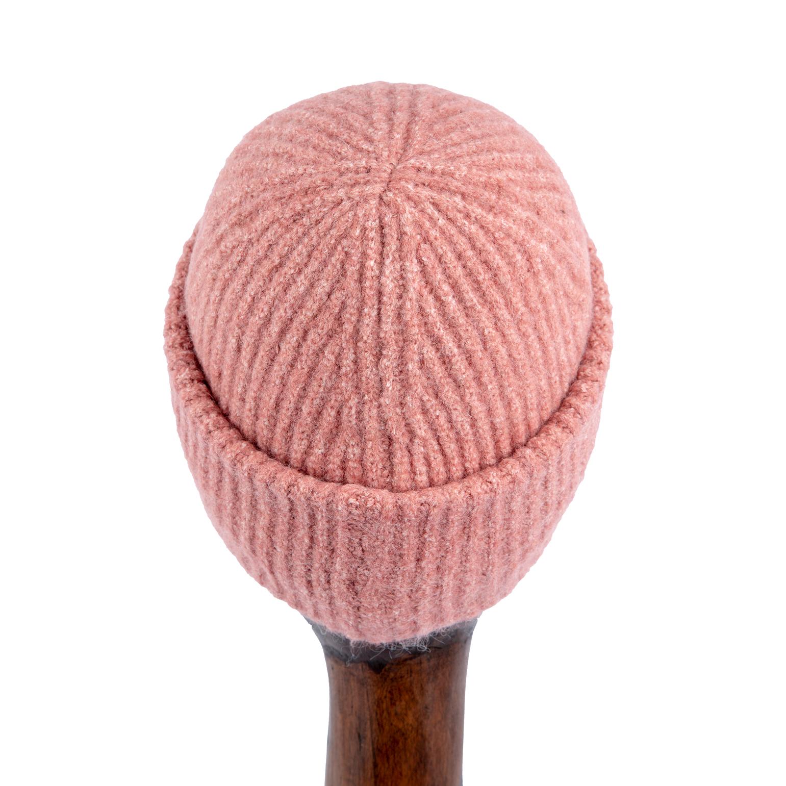 Pink ribbed knit beanie with Arctic Program logo patch, unisex winter hat.