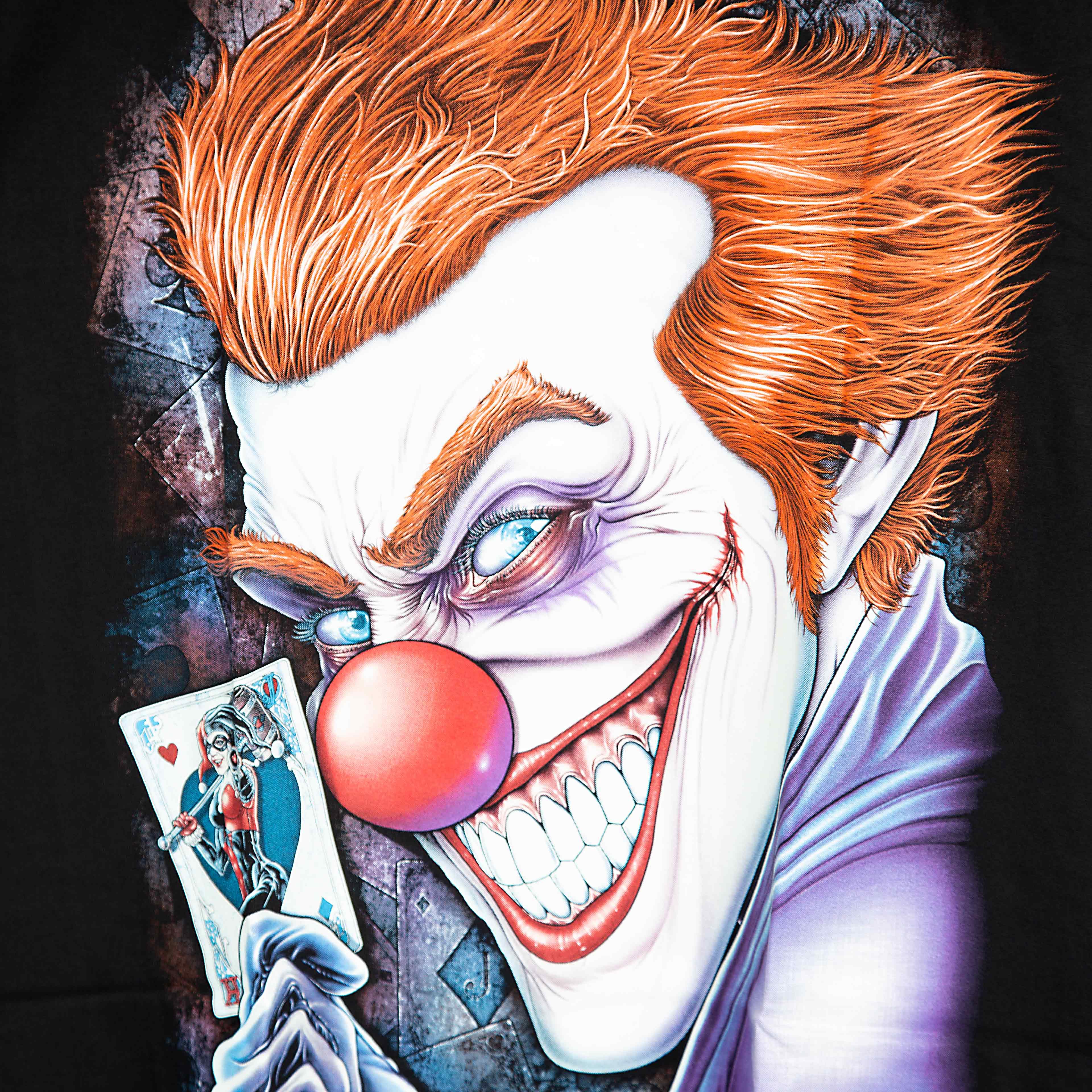 "Rock Eagle black unisex T-shirt with vivid sinister clown graphic holding a playing card – gothic streetwear design"