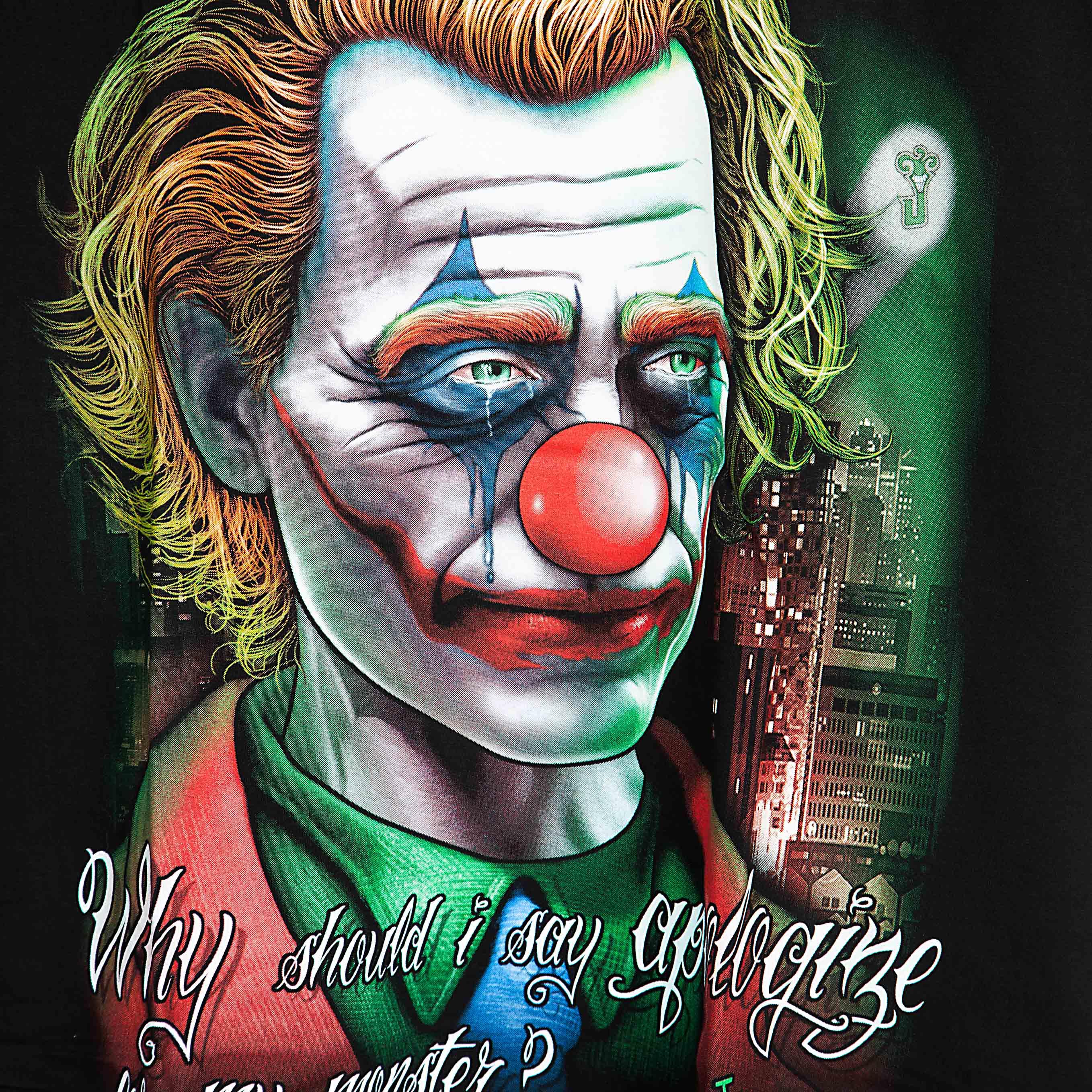 Rock Eagle black t-shirt with a detailed, colorful graphic of the Joker's face, clown makeup, and the quote "Why should I say sorry for my monster?" in red script.