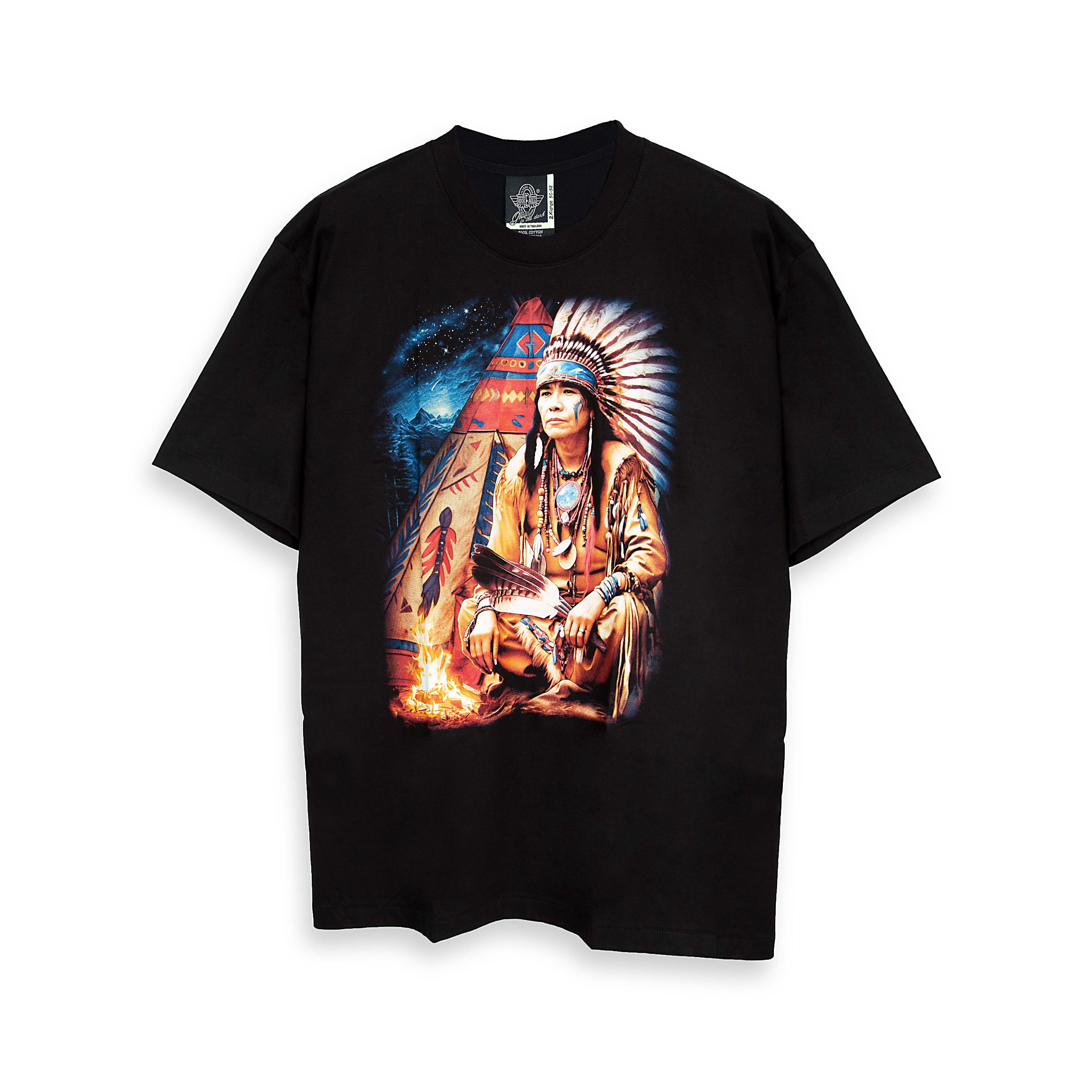 Rock Eagle black unisex t-shirt with a detailed graphic of a Native American Chief in a feather bonnet kneeling by a campfire near a teepee under a star-lit night sky.