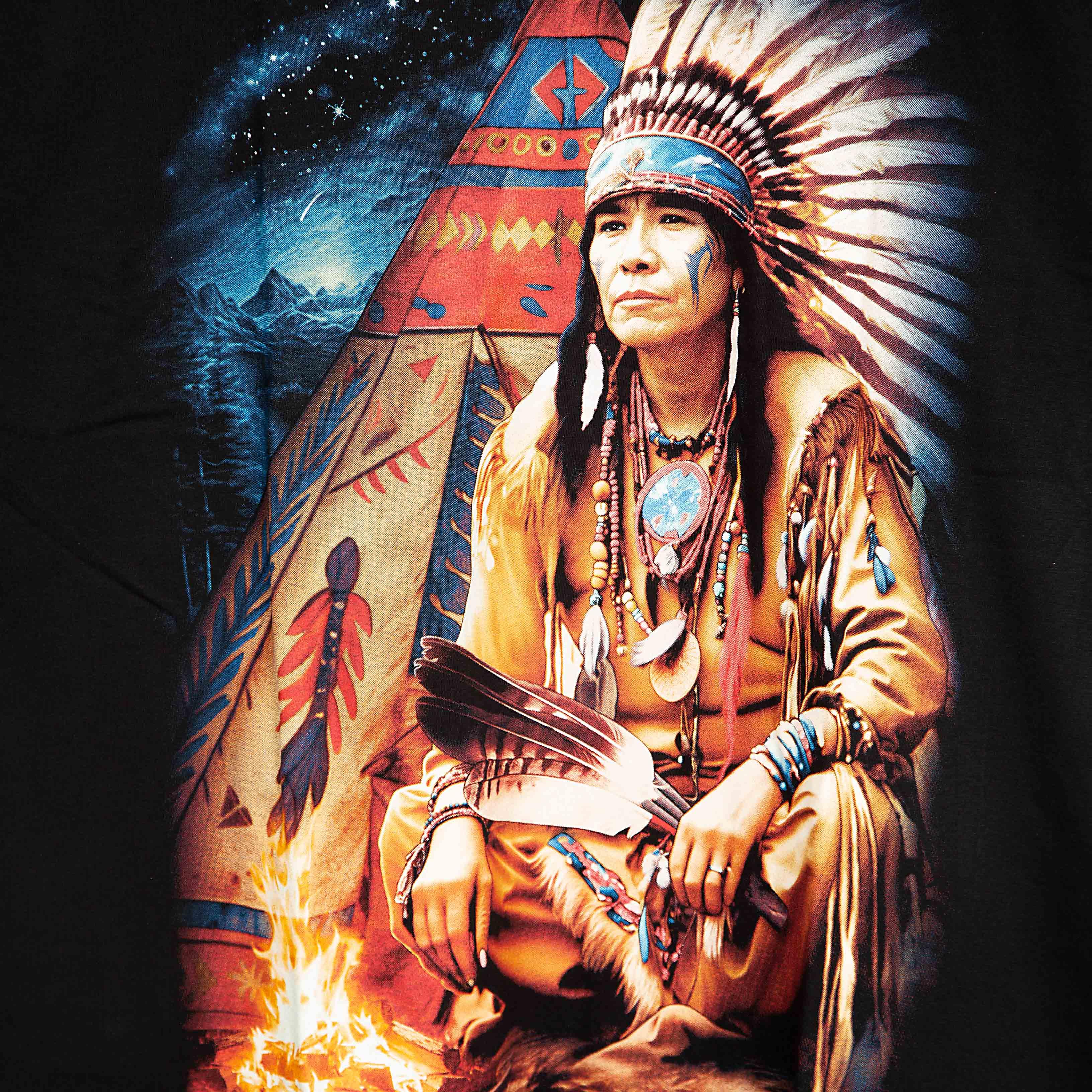 Rock Eagle black unisex t-shirt with a detailed graphic of a Native American Chief in a feather bonnet kneeling by a campfire near a teepee under a star-lit night sky.