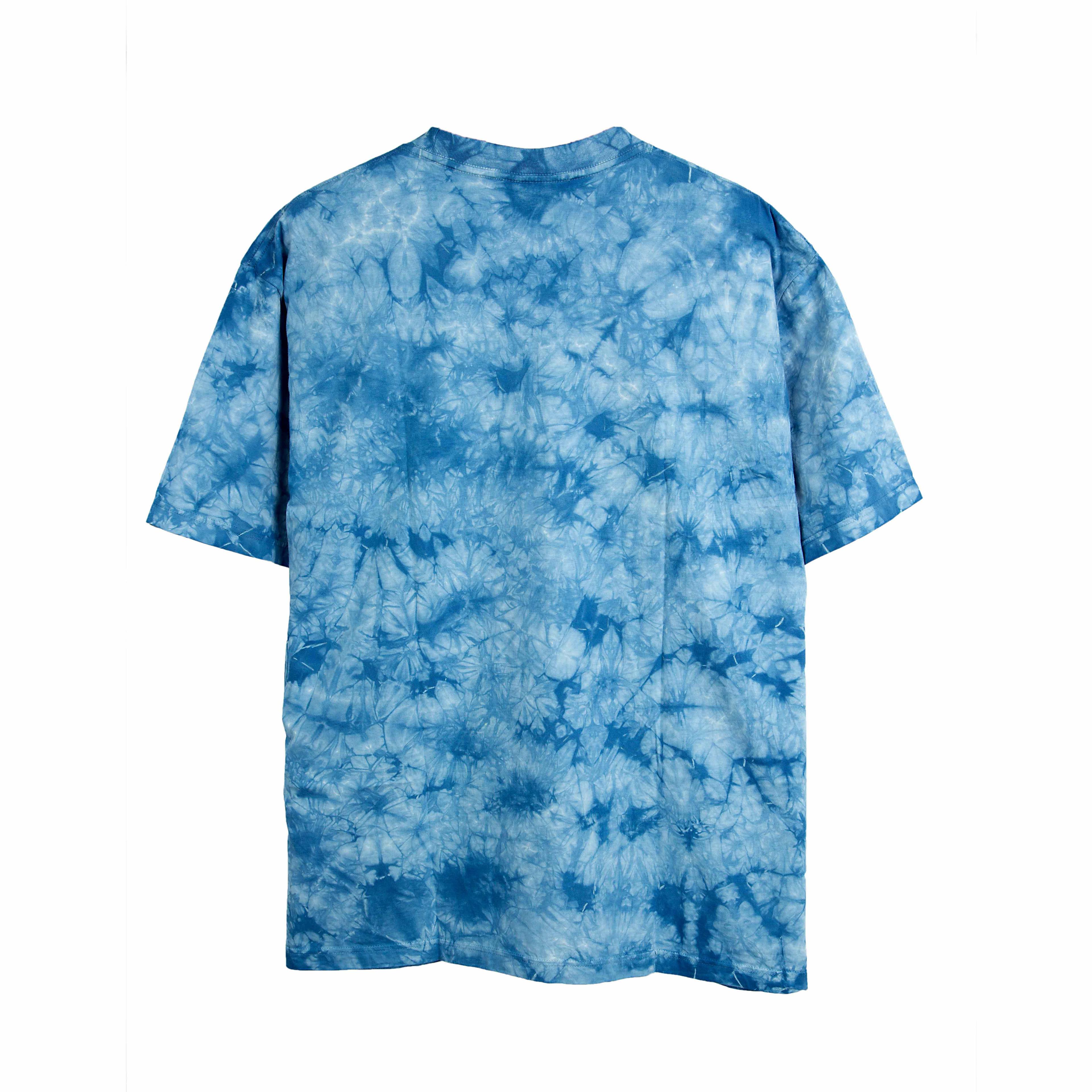 Rock Eagle Blue Tie-Dye T-shirt with a detailed, central graphic of two dolphins swimming underwater above a colourful coral reef surrounded by tropical fish.