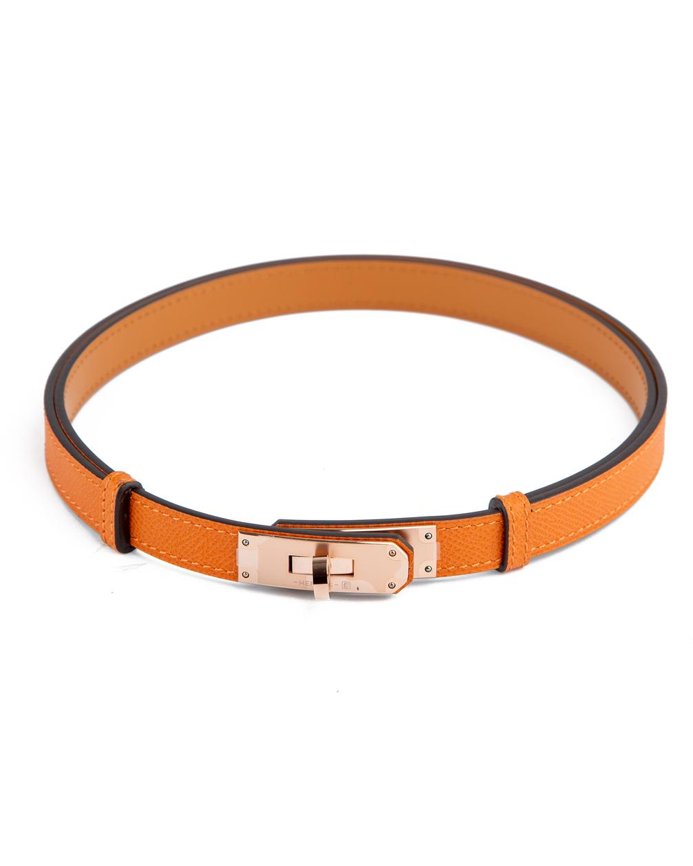 men's orange skinny leather belt with gold interlock buckle."