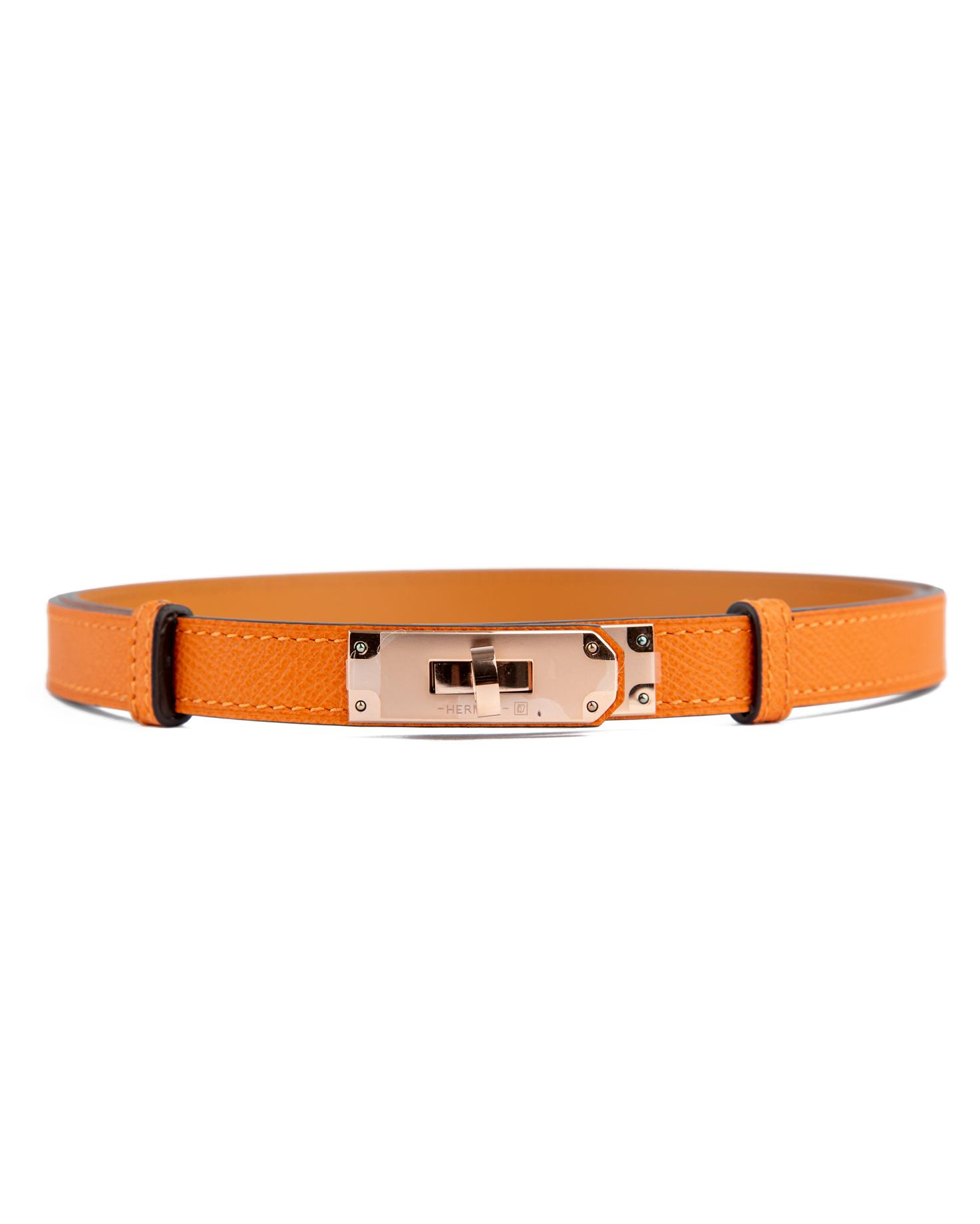 Men's orange skinny leather belt with gold interlock buckle