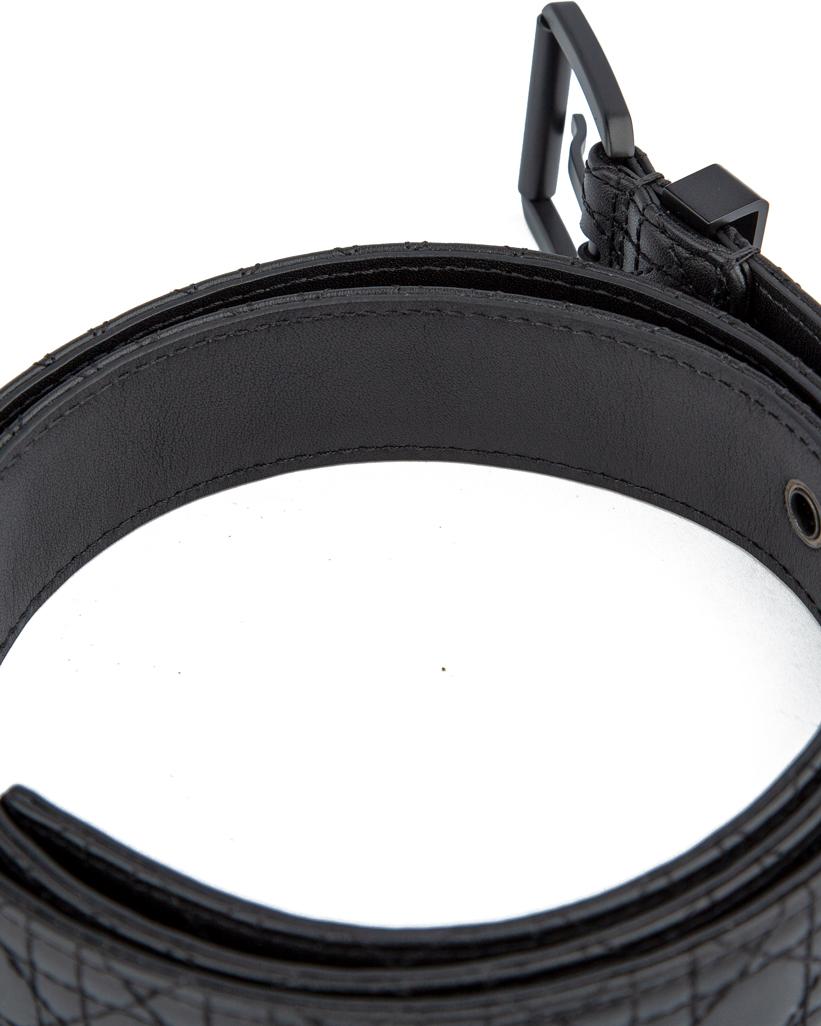 Luxury black quilted leather belt with a sleek matte black buckle, perfect for men and women seeking a refined and sophisticated fashion accessory.