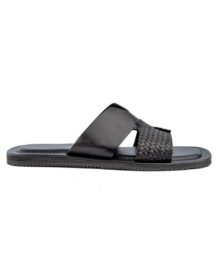 Elegant black woven cross-strap leather sandals with cushioned footbed and durable rubber sole, perfect for casual and semi-formal occasions.