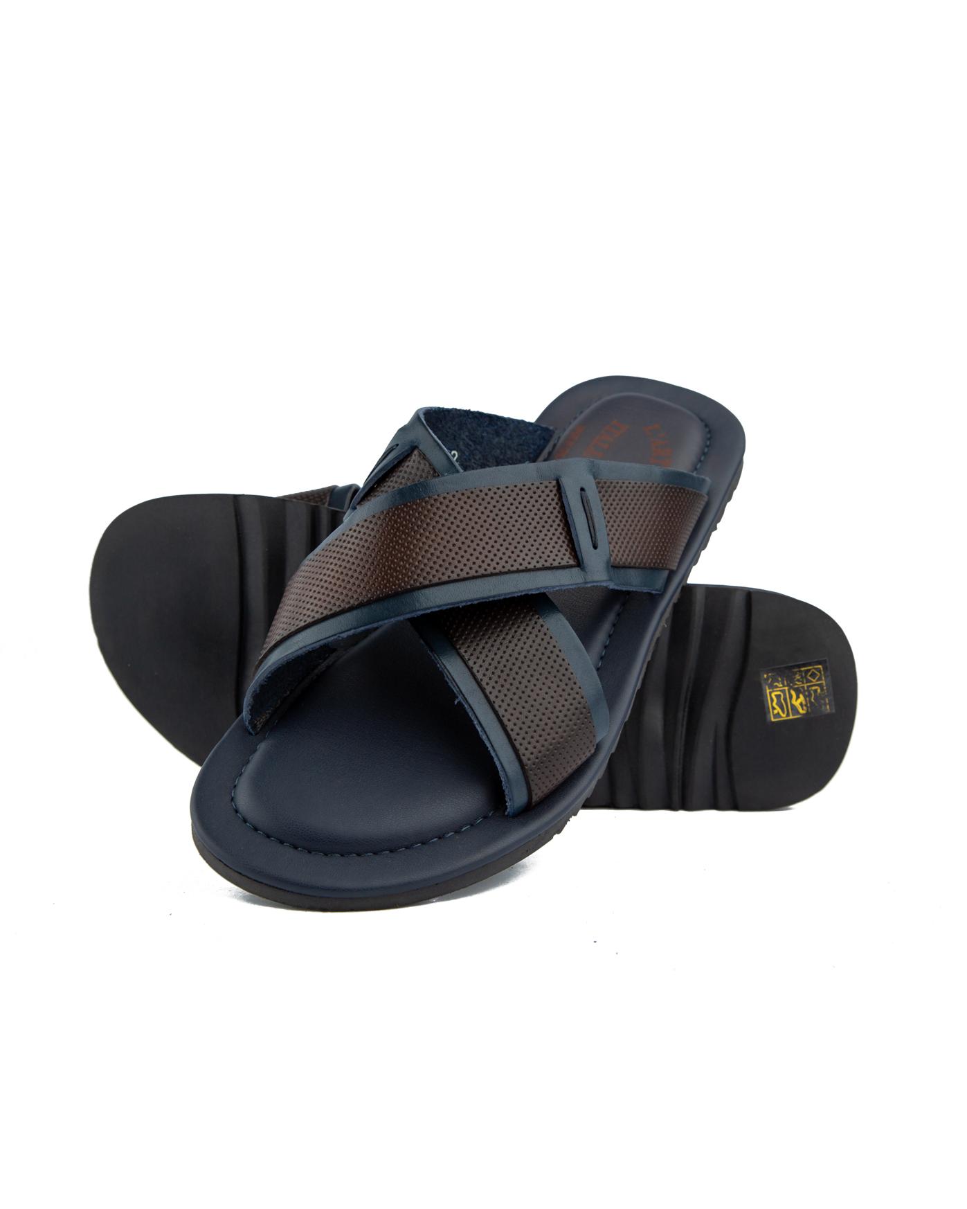 Men's navy blue leather cross strap sandals with dark brown accents.