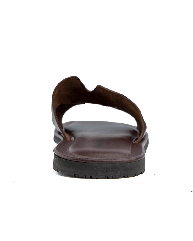 Stylish brown woven cross-strap leather sandals with cushioned footbed and anti-slip rubber sole, perfect for casual and semi-formal wear.