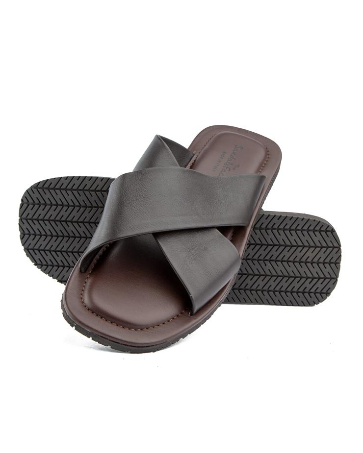 Elegant black cross-strap leather sandals with cushioned footbed and durable rubber sole, offering both comfort and style for casual and semi-formal wear.