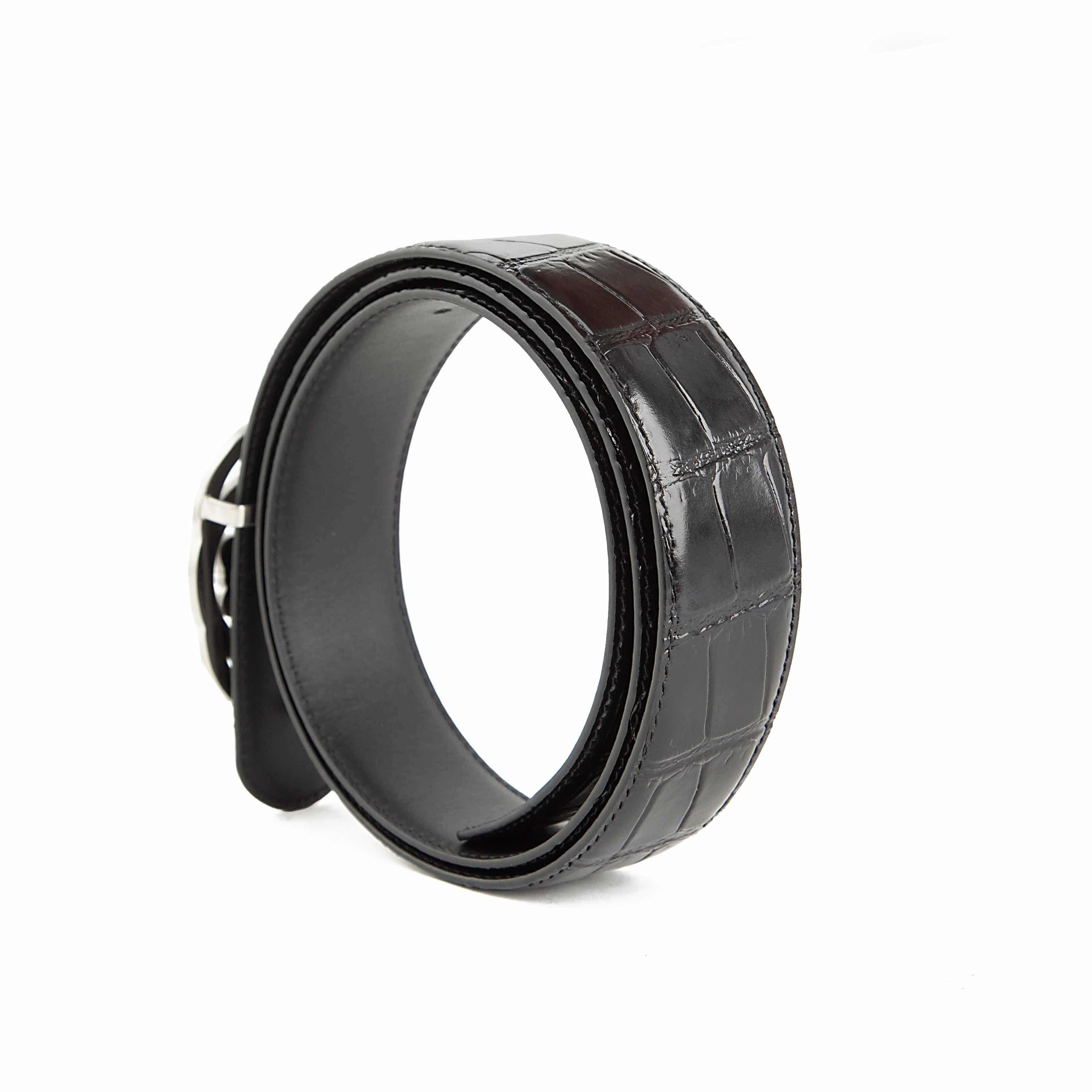 This is a high-fashion, statement Black Leather Belt defined by its bold, colorful design.