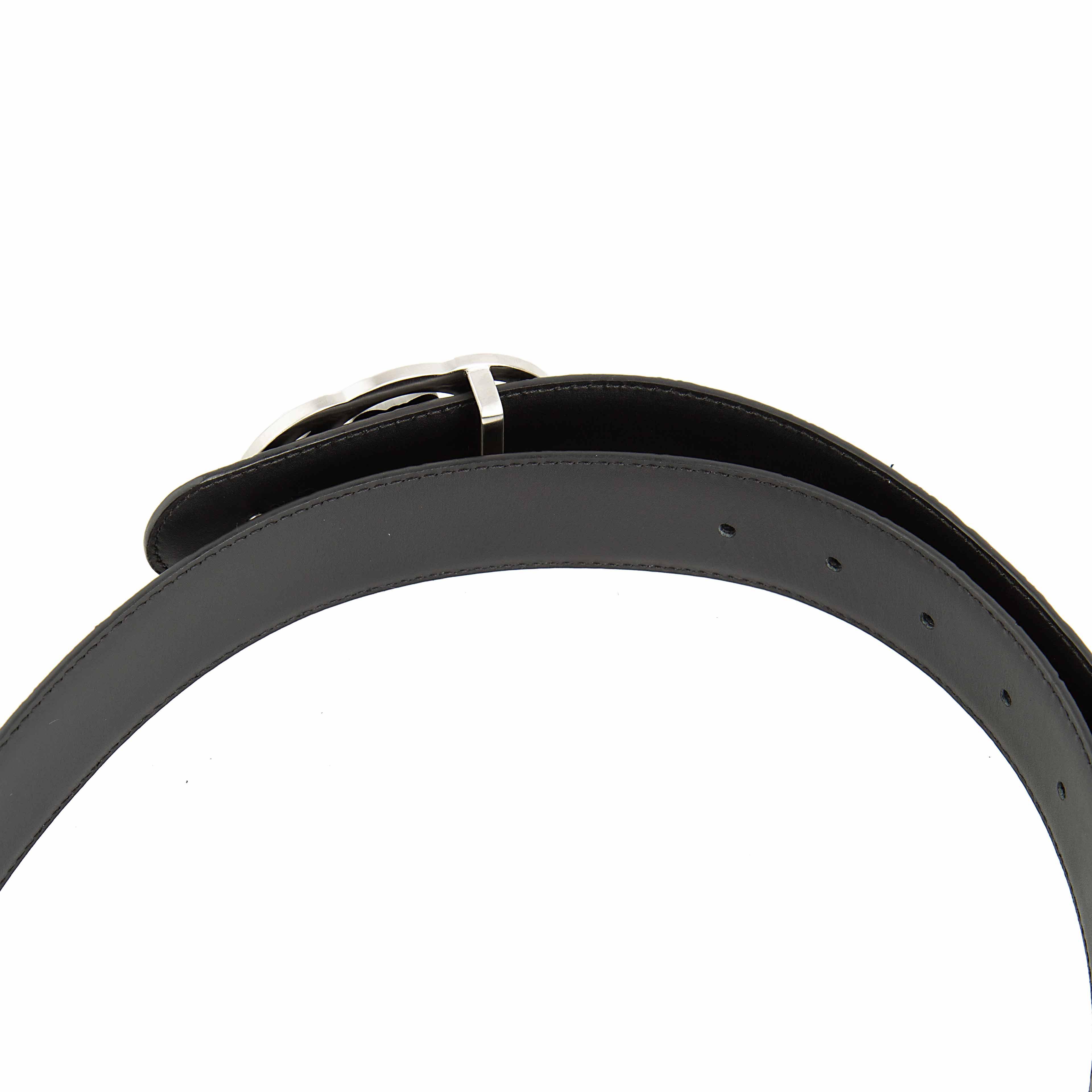 This is a high-fashion, statement Black Leather Belt defined by its bold, colorful design.