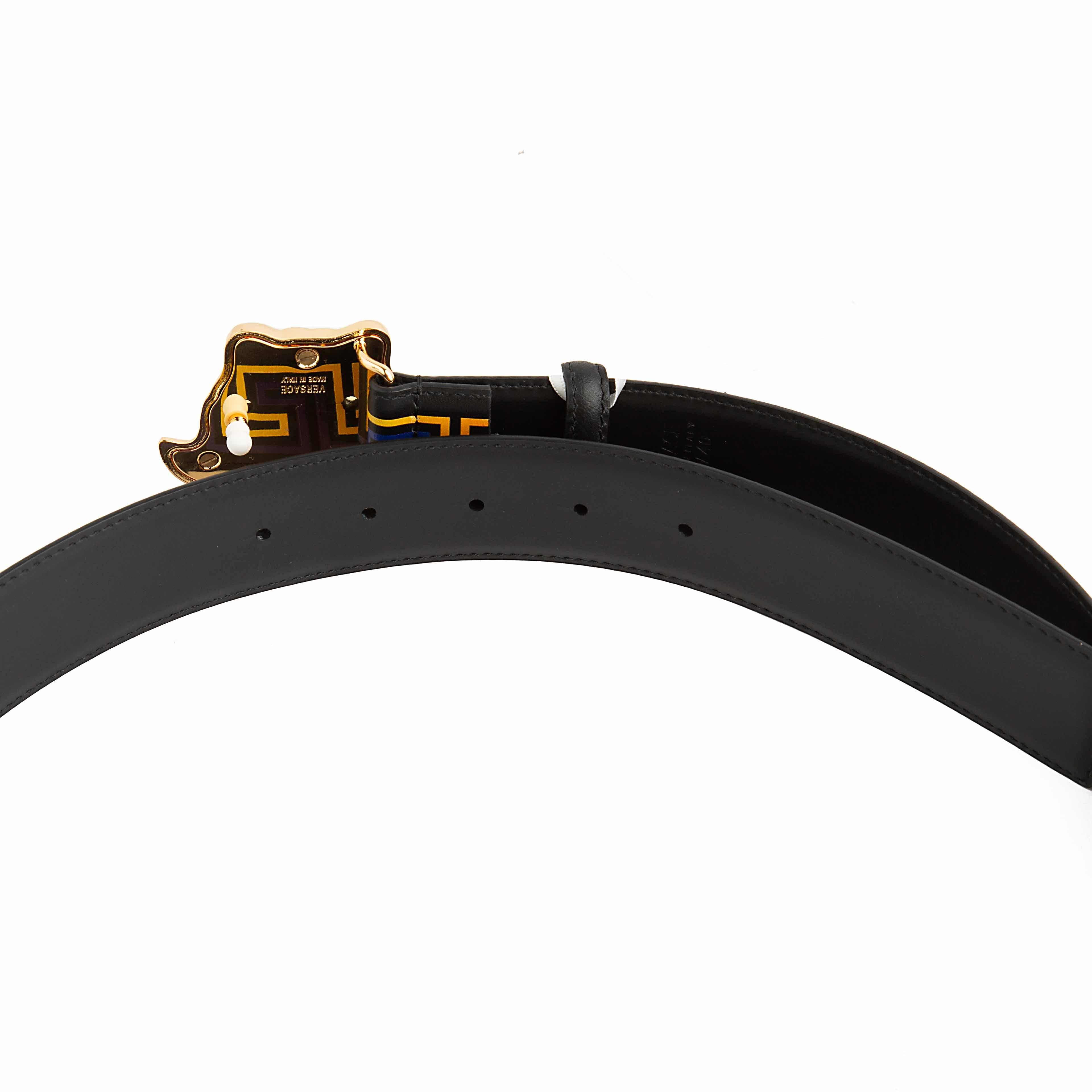This luxury Black Leather Belt is a bold, high-fashion accessory defined by its vibrant detailing and signature design.