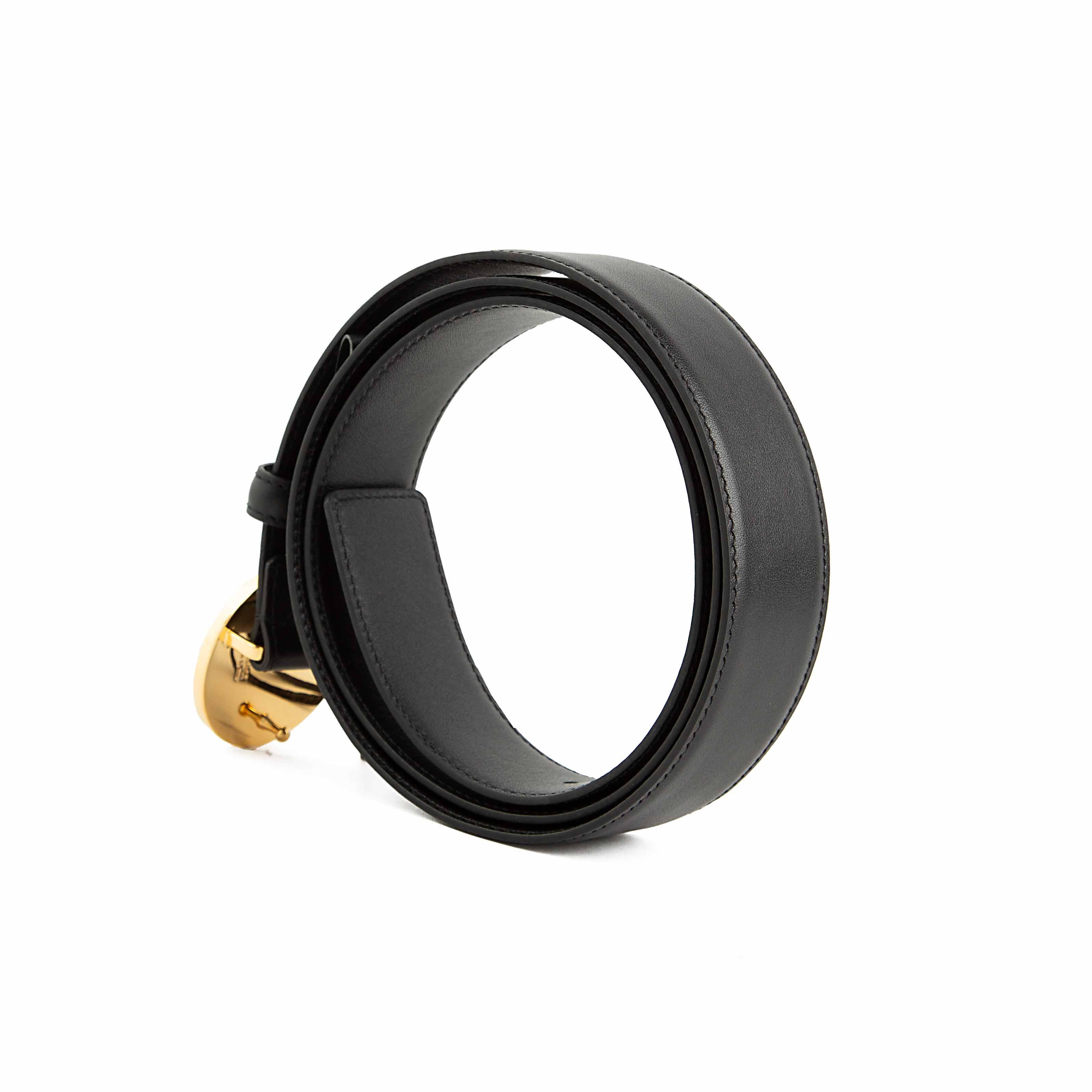 This is a luxurious and instantly recognizable Black Leather Belt defined by its iconic hardware.