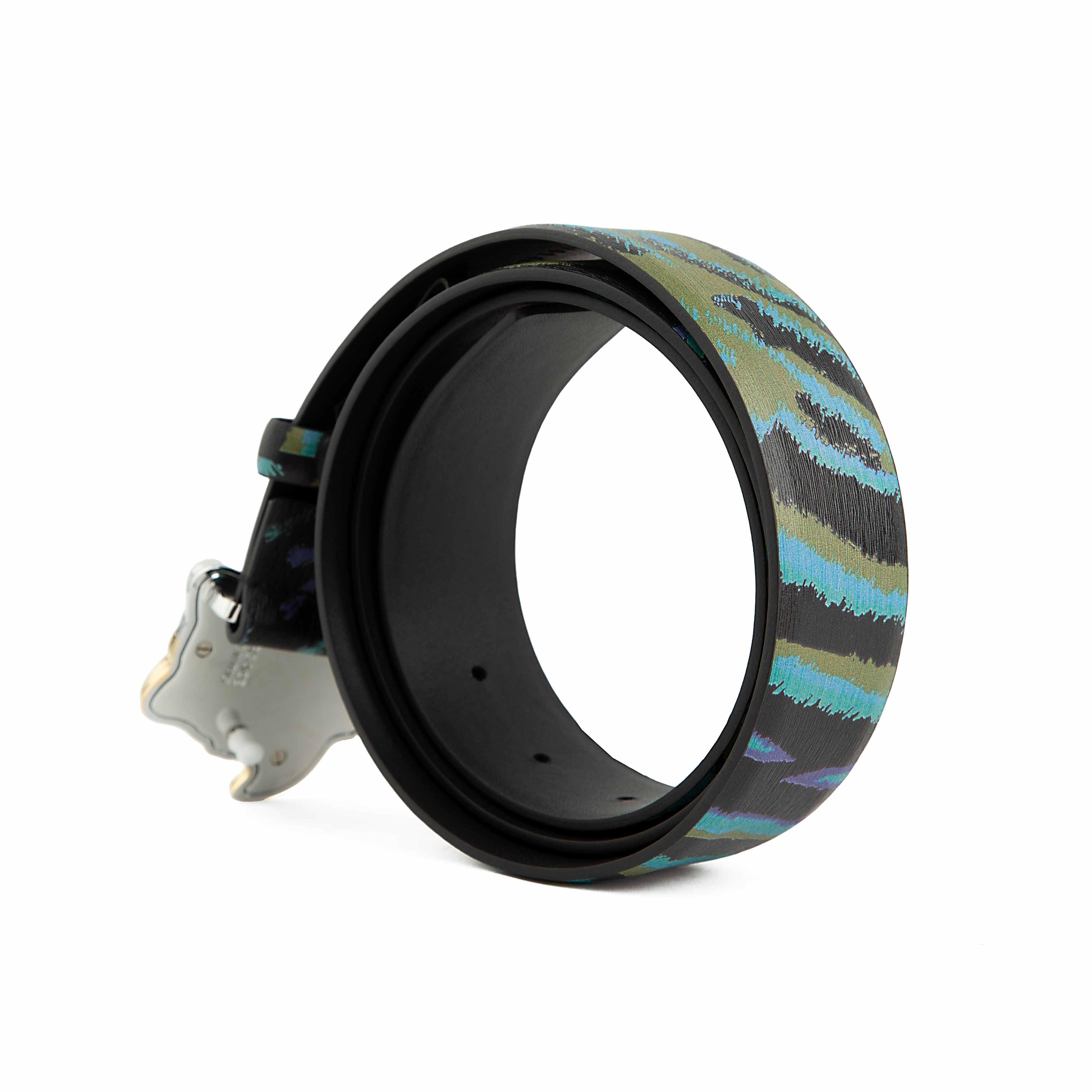 This statement accessory blends bold contemporary art with high-fashion heritage.