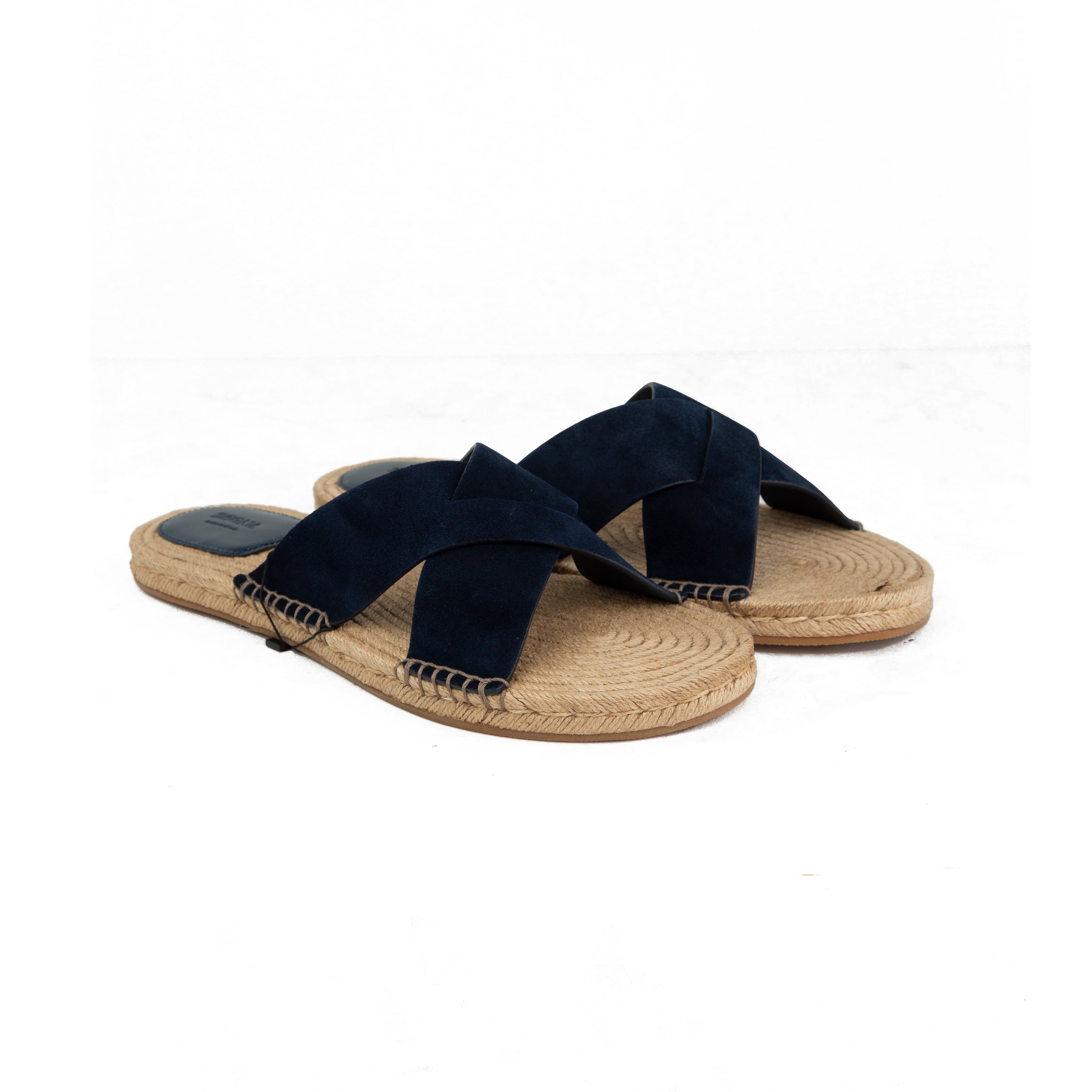Discover ZEGNA suede espadrilles. Premium cross-strap slides featuring hand-stitched jute soles and Italian craft. Perfect for luxury summer style.
