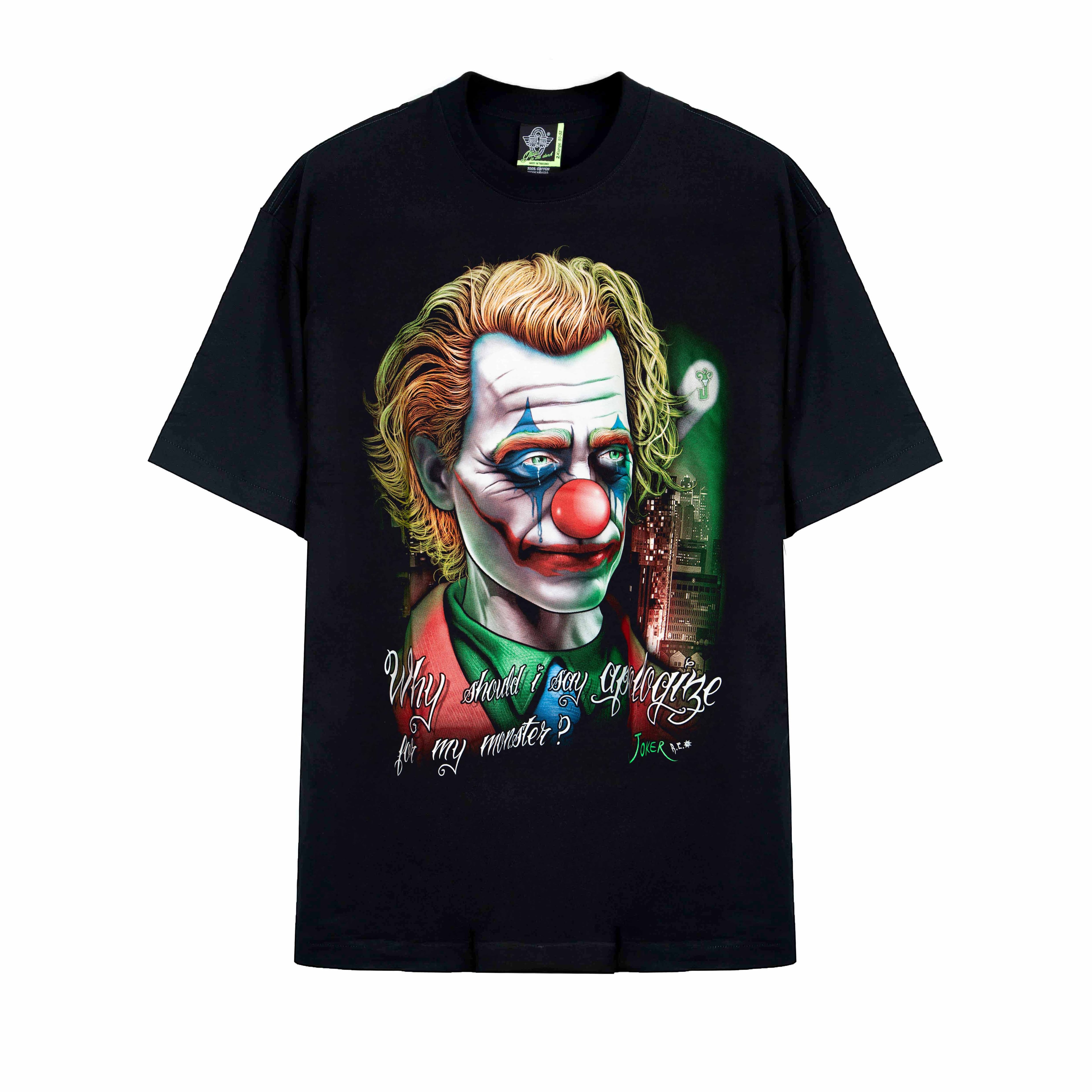 Rock Eagle black t-shirt with a detailed, colorful graphic of the Joker's face, clown makeup, and the quote "Why should I say sorry for my monster?" in red script.
