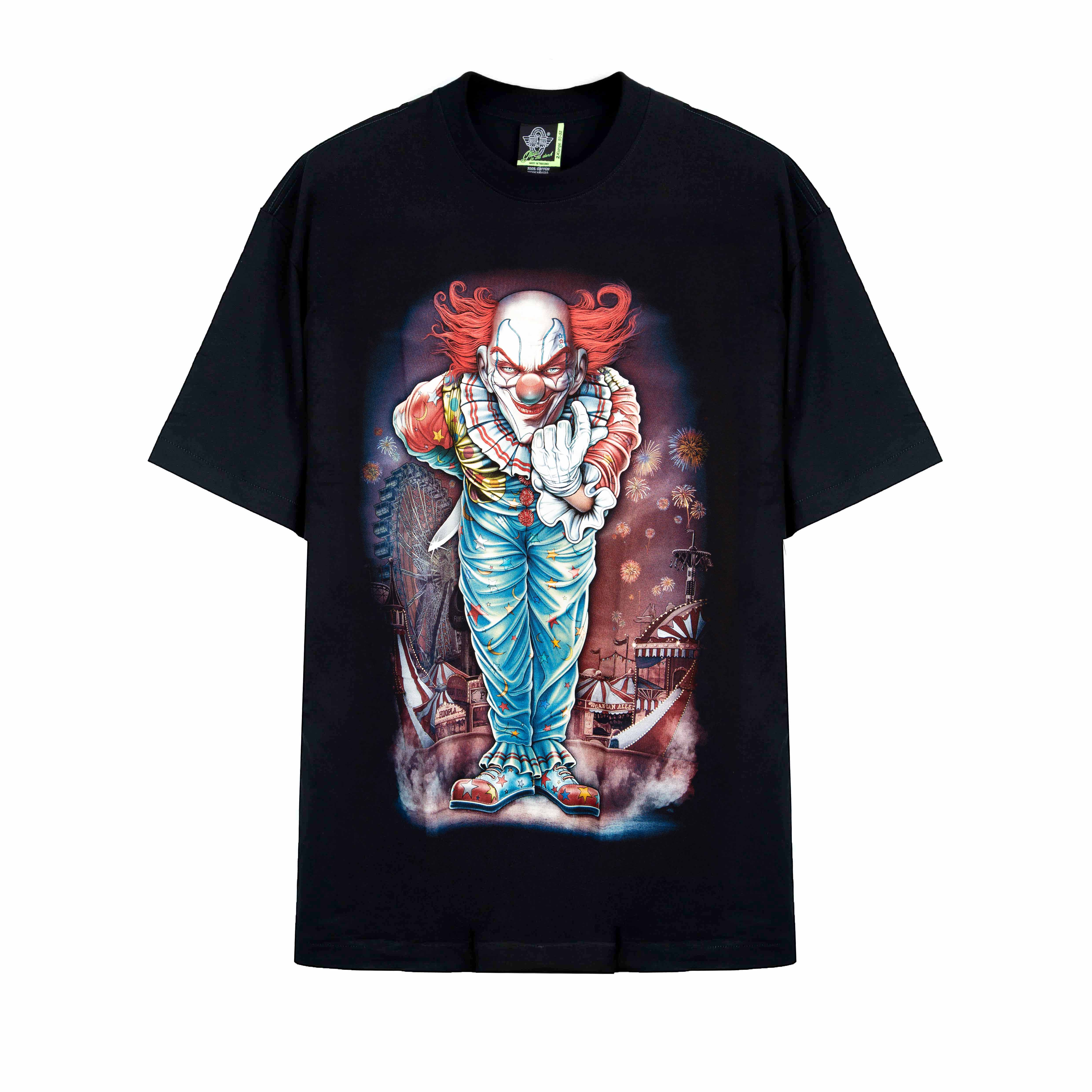 Rock Eagle black unisex t-shirt with a full-body graphic of a scary clown with red hair standing in a dilapidated, colorful carnival background.