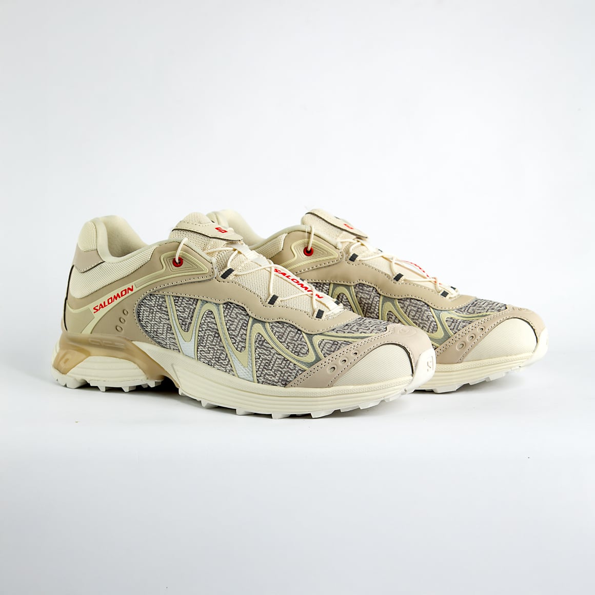 style with the Salomon XT-Whisper Panhui. These unisex sneakers blend trail-ready tech with modern aesthetics for unmatched comfort and versatility. Perfect for urban adventures and celebrating heritage