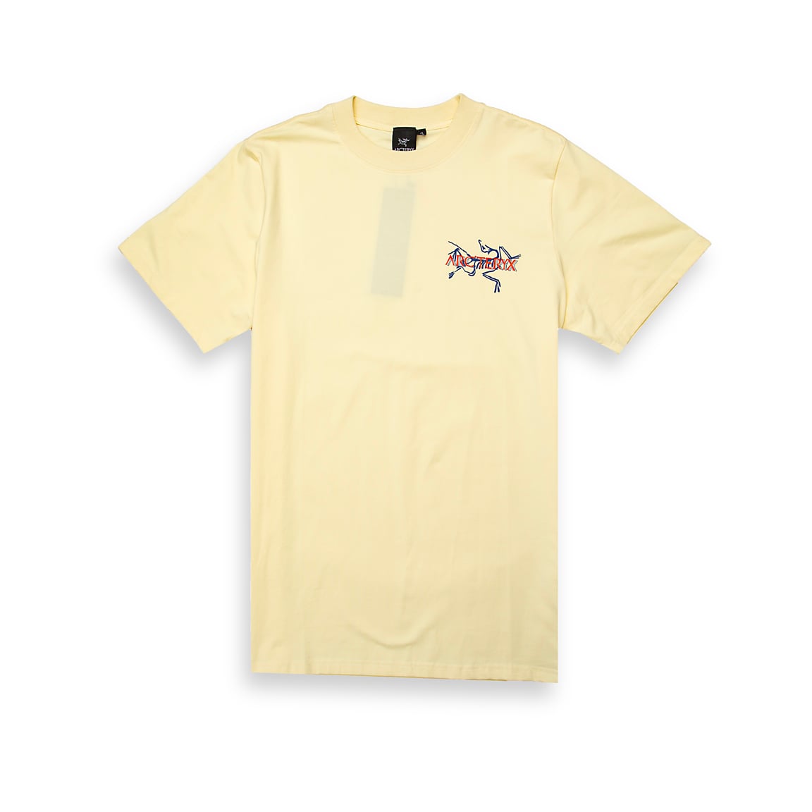 Cream Arc'teryx t-shirt with small multi-colour outlined fossil logo on chest, performance cotton, unisex outdoor wear.