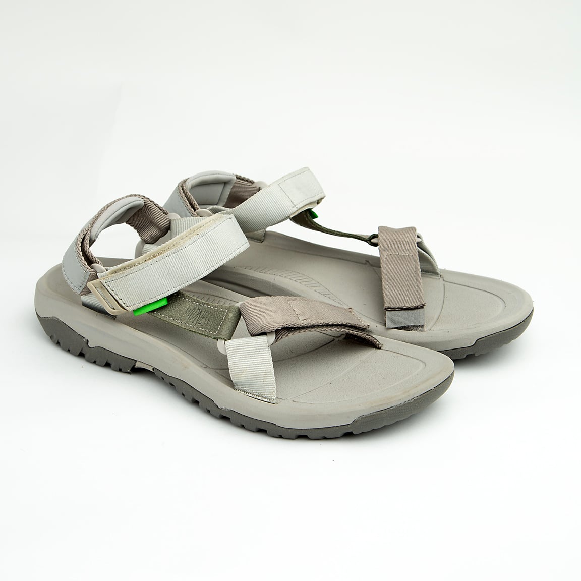 Grey unisex adjustable outdoor sandals with cushioned footbed and durable rubber sole.