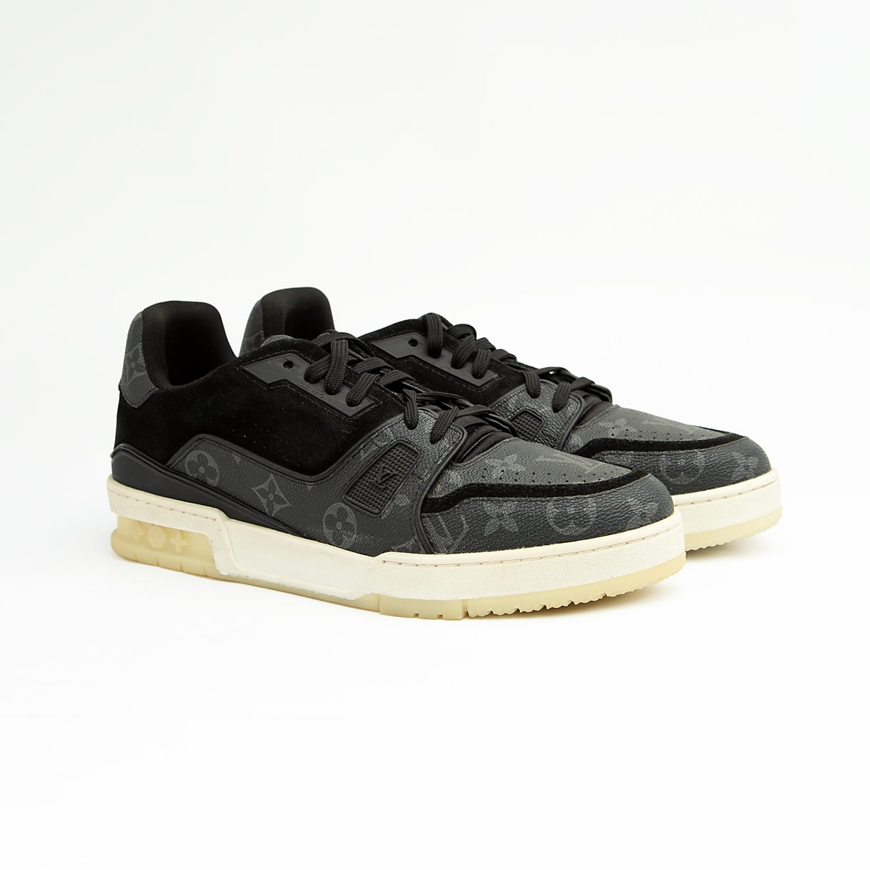 The Obsidian Monogram Ace is a high-fashion low-top sneaker that remixes a vintage court shoe silhouette with signature luxury detailing.