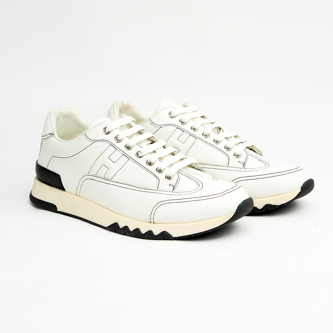 This sneaker perfectly balances classic athletic form with high-end craftsmanship.