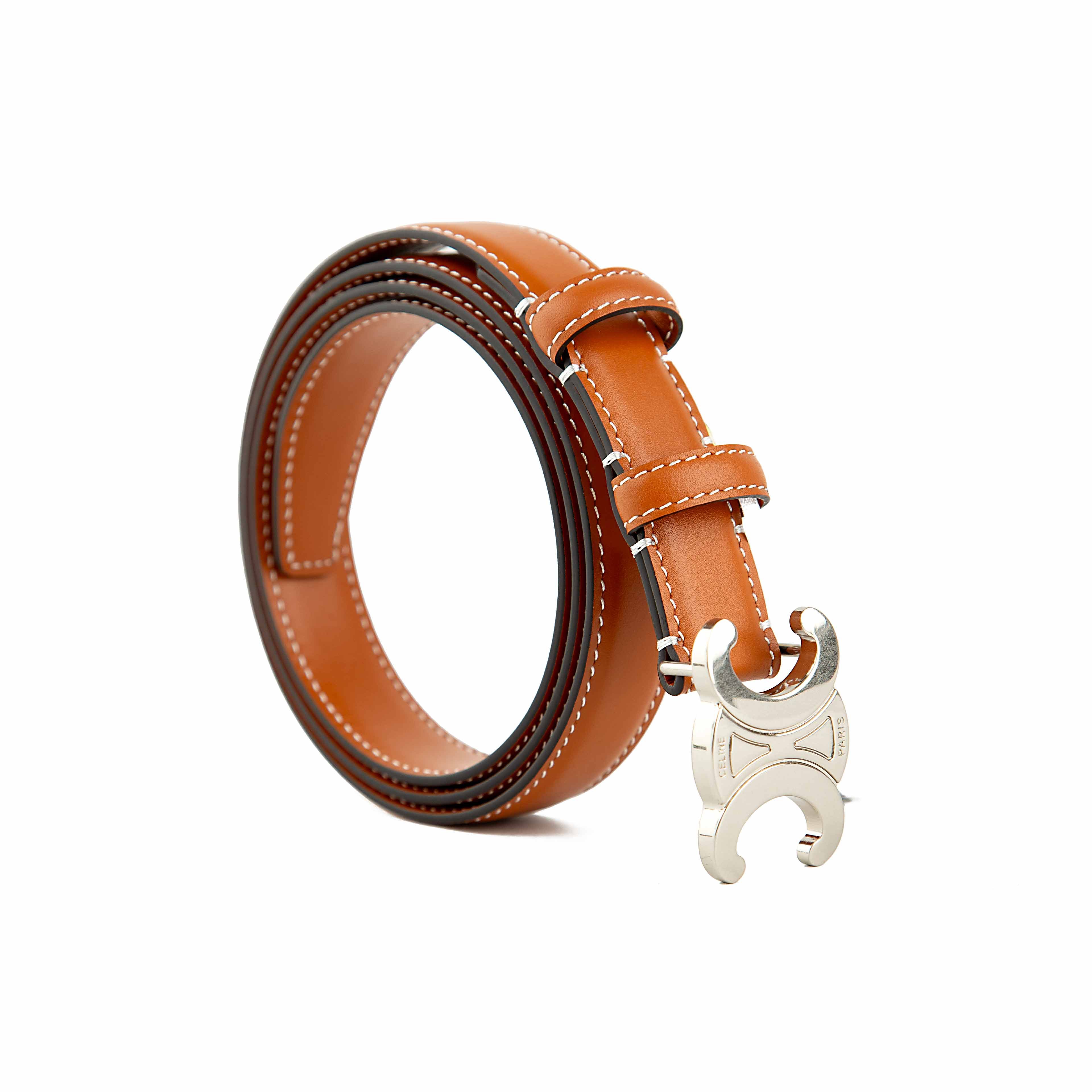 The centerpiece is the iconic Triomphe buckle, an articulated silver-tone metallic plate inspired by the chains surrounding the Arc de Triomphe in Paris.